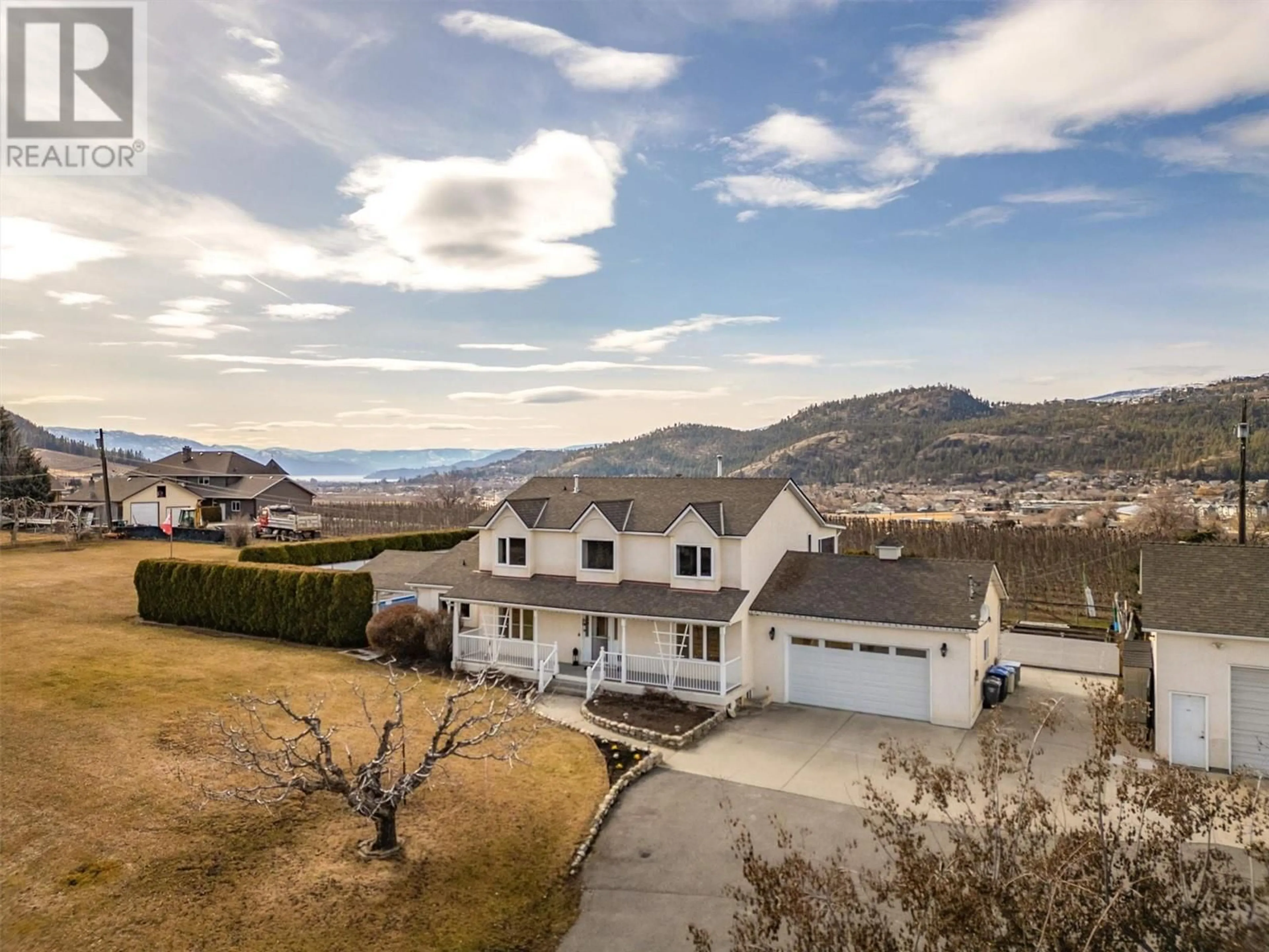 A pic from outside/outdoor area/front of a property/back of a property/a pic from drone, mountain view for 2547 SEXSMITH ROAD, Kelowna British Columbia V1V2G6