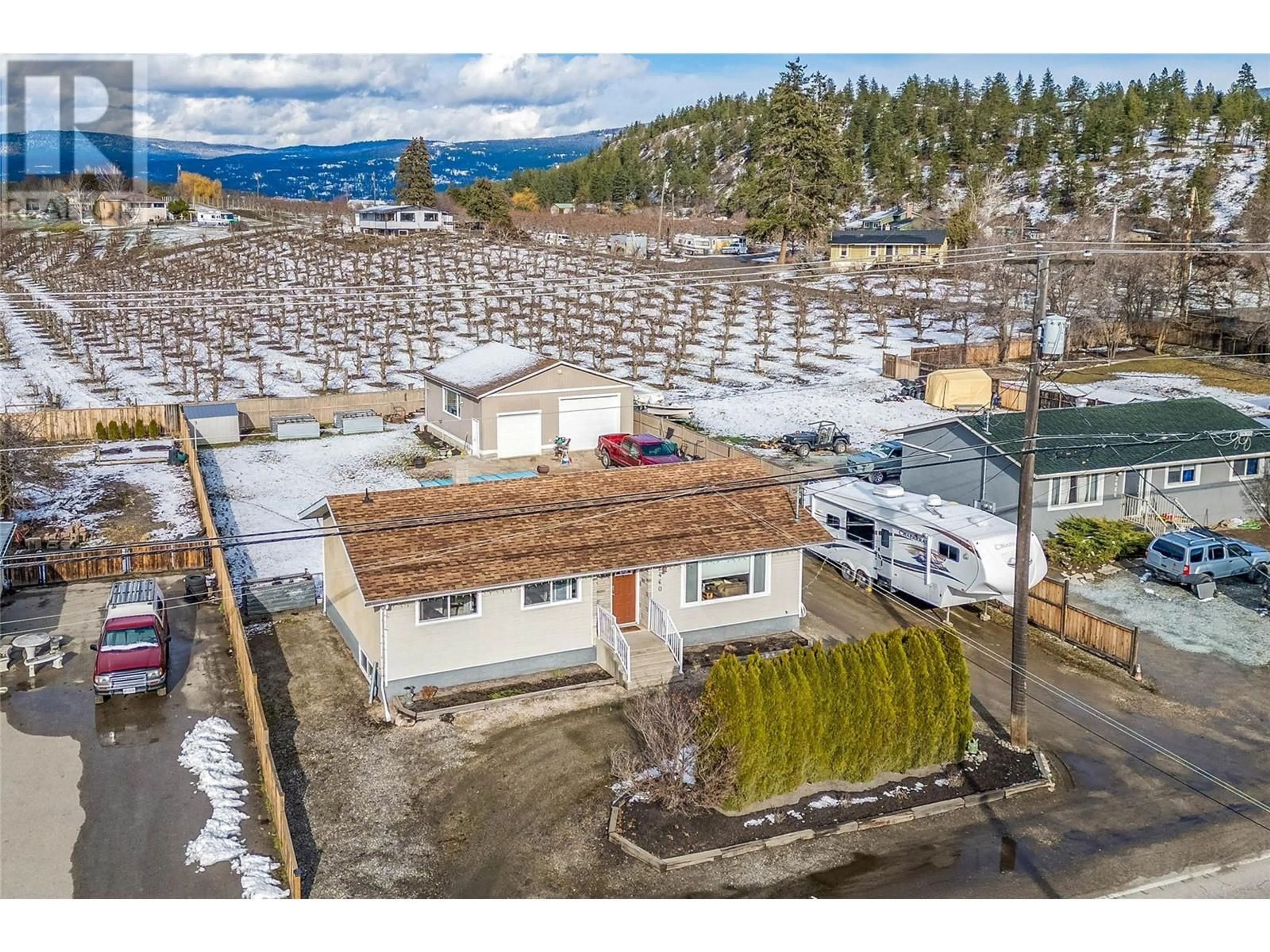 A pic from outside/outdoor area/front of a property/back of a property/a pic from drone, unknown for 2460 Sexsmith Road, Kelowna British Columbia V1V2E9