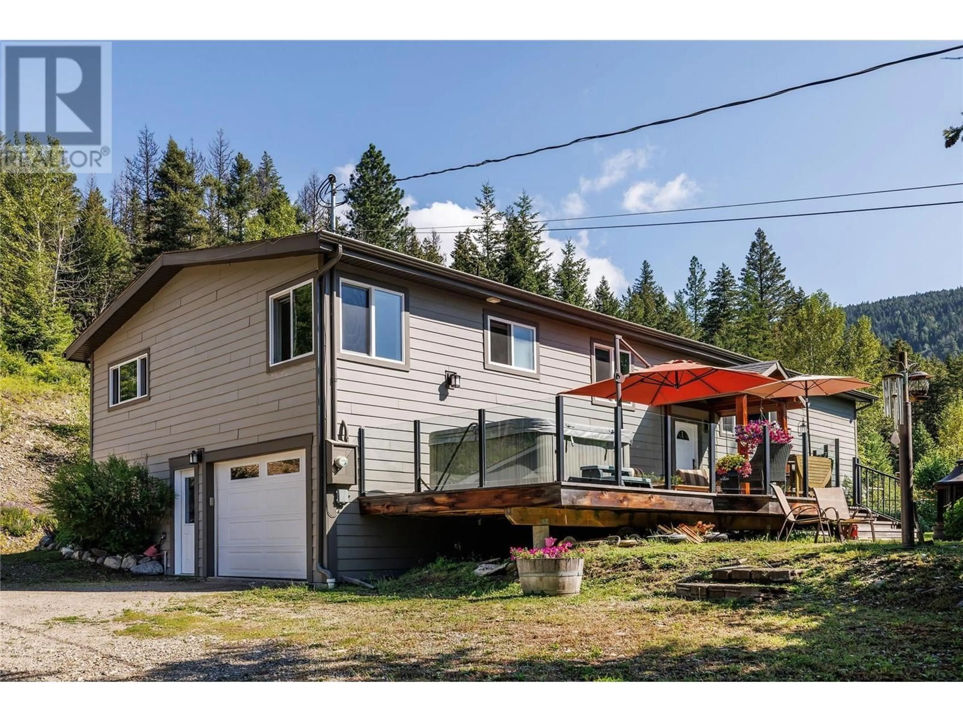 Home with vinyl exterior material, street for 8514 SUN VALLEY ROAD, Kelowna British Columbia V1P1J3