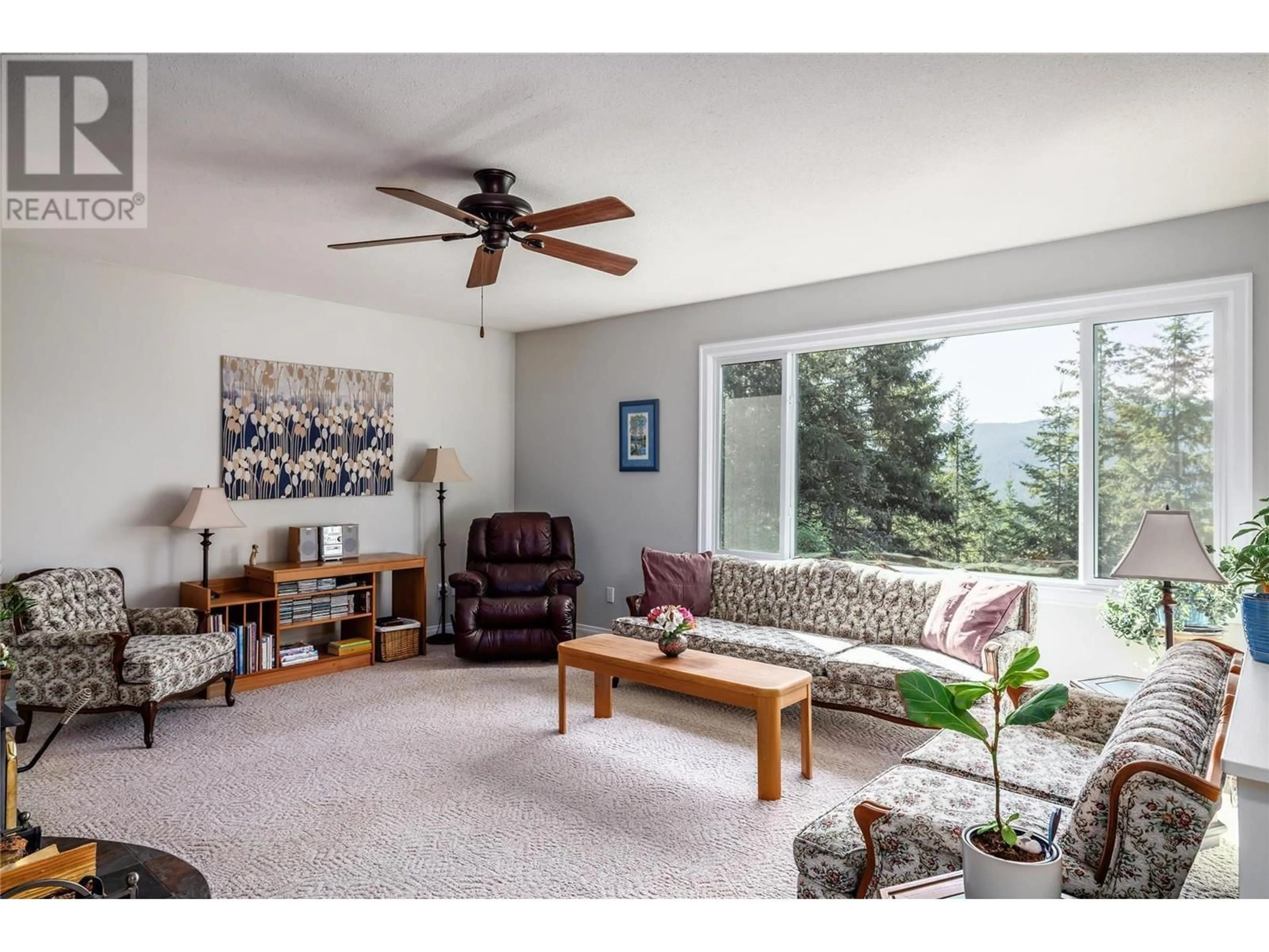 Living room with furniture, unknown for 8514 SUN VALLEY ROAD, Kelowna British Columbia V1P1J3