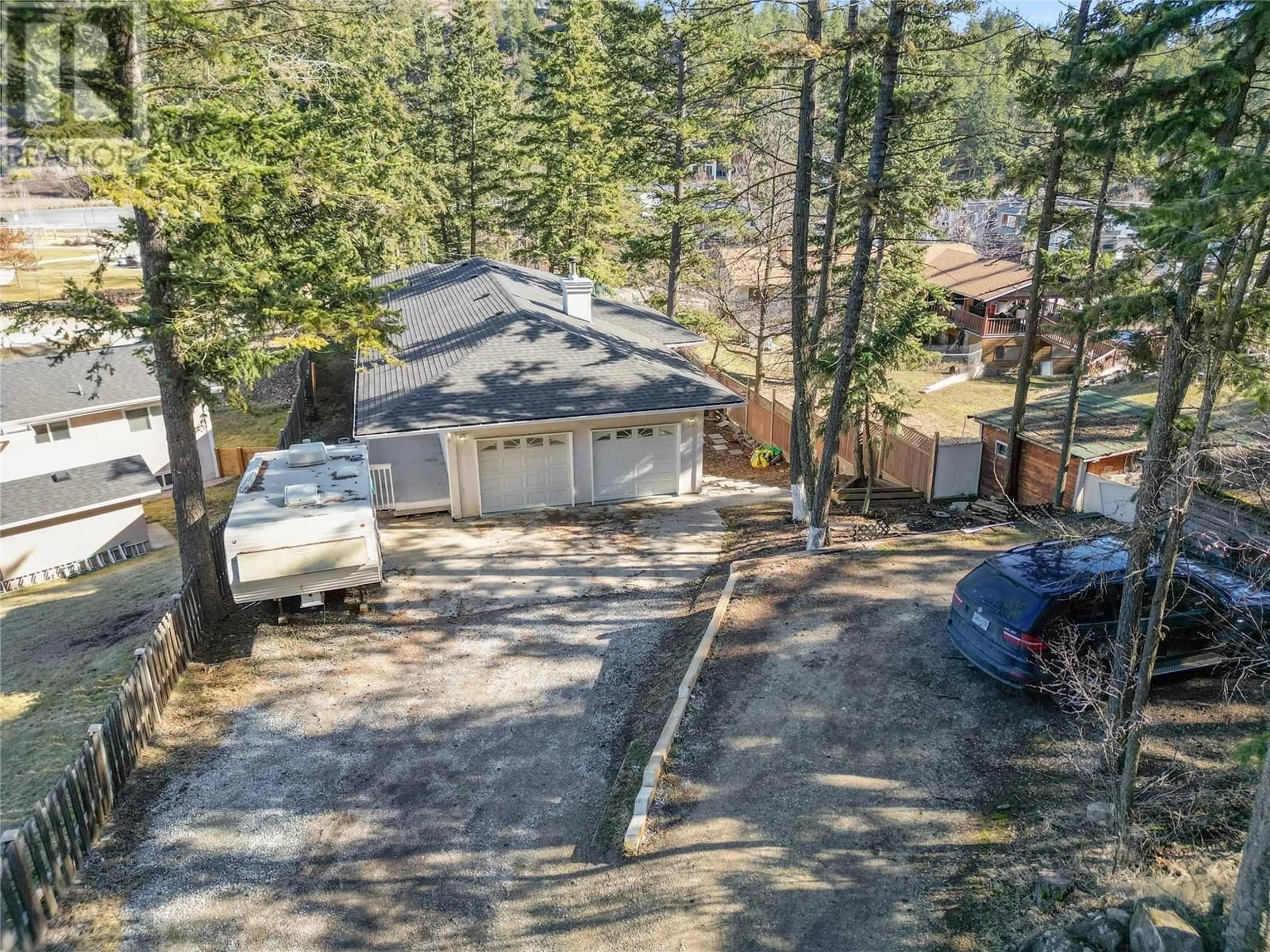 A pic from outside/outdoor area/front of a property/back of a property/a pic from drone, forest/trees view for 334 CLIFTON ROAD SOUTH, Kelowna British Columbia V1V1A5