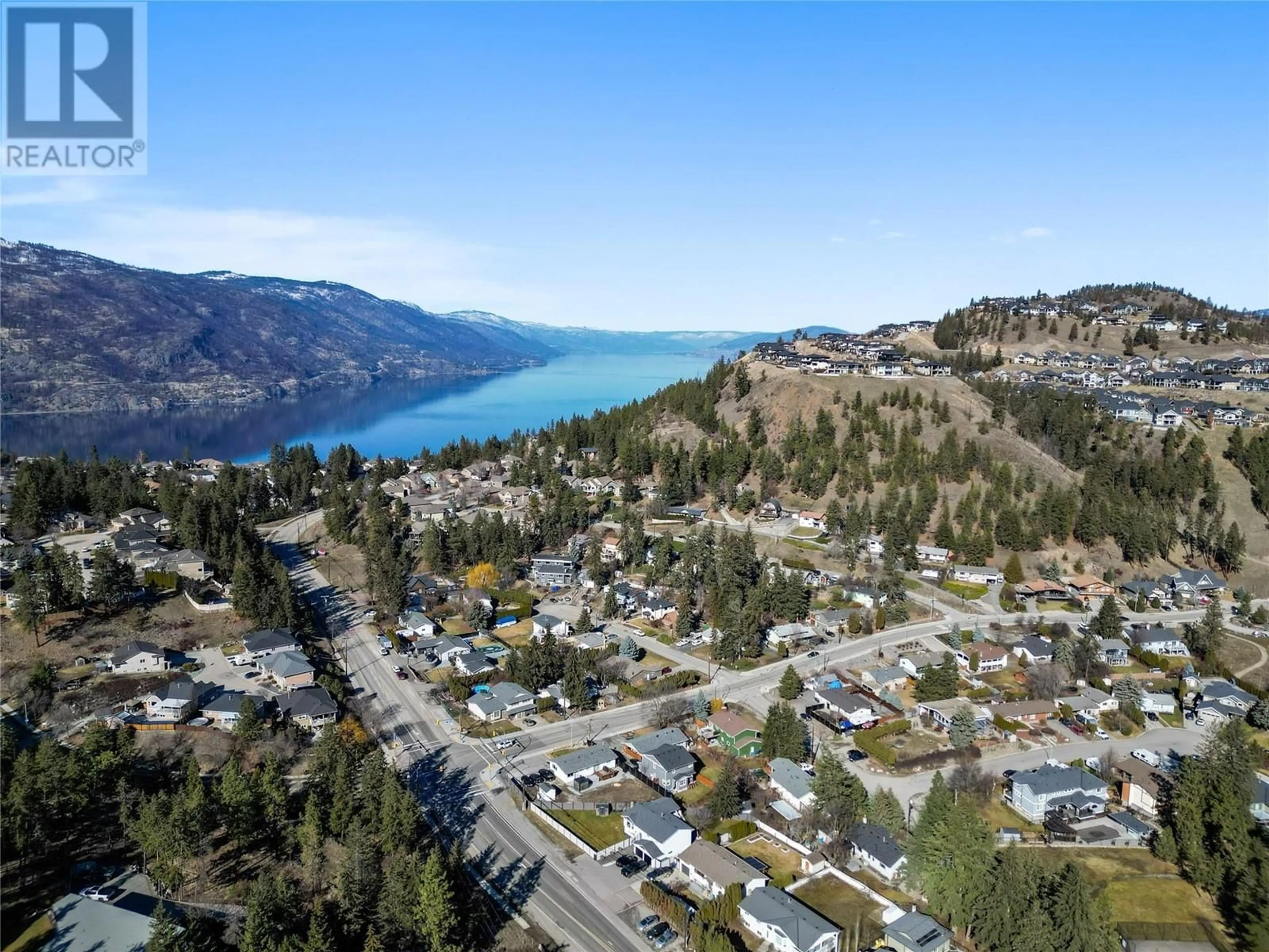 A pic from outside/outdoor area/front of a property/back of a property/a pic from drone, water/lake/river/ocean view for 334 CLIFTON ROAD SOUTH, Kelowna British Columbia V1V1A5