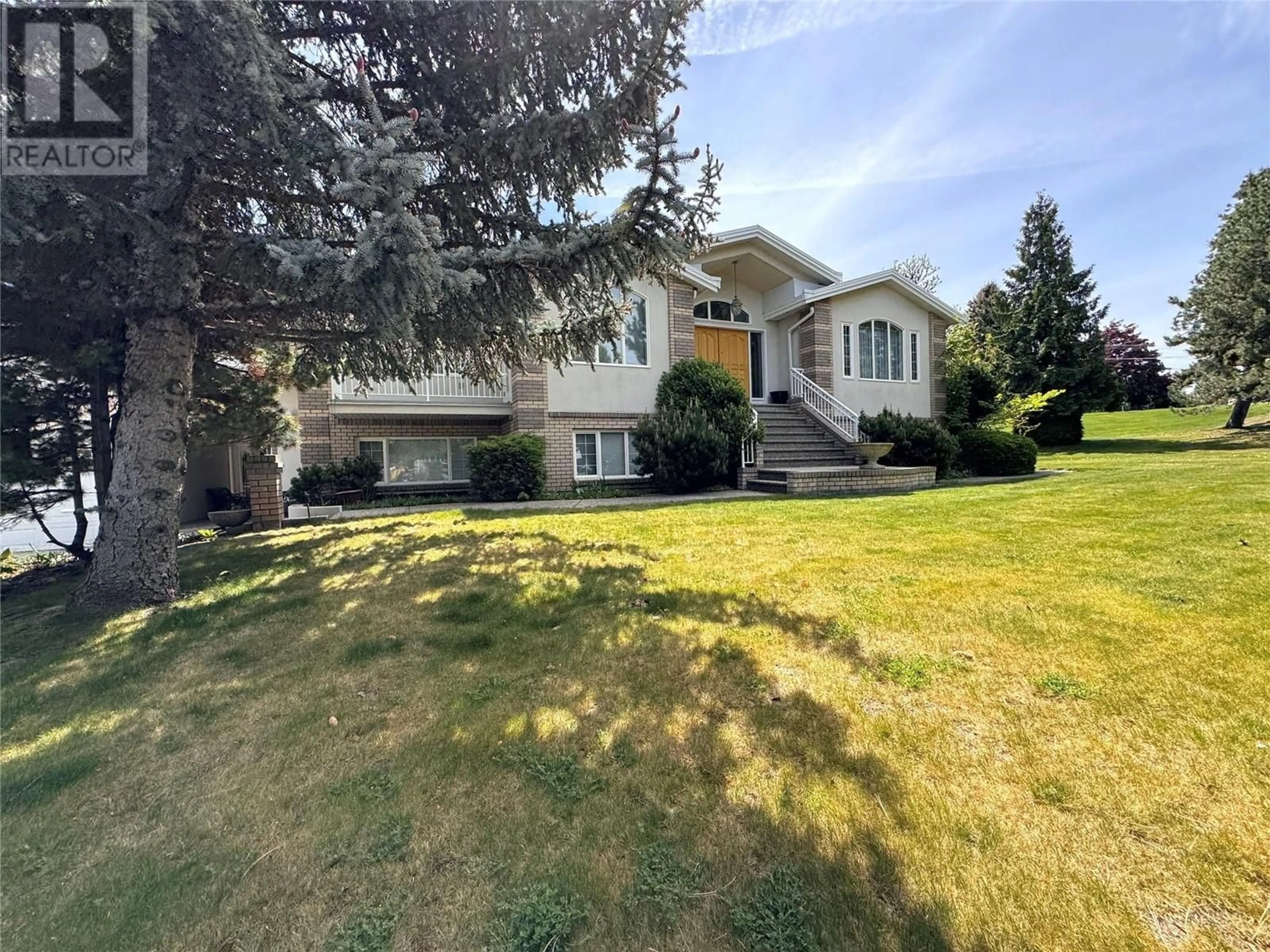 A pic from outside/outdoor area/front of a property/back of a property/a pic from drone, street for 2495 CRESTVIEW ROAD, West Kelowna British Columbia V1Z1Z4