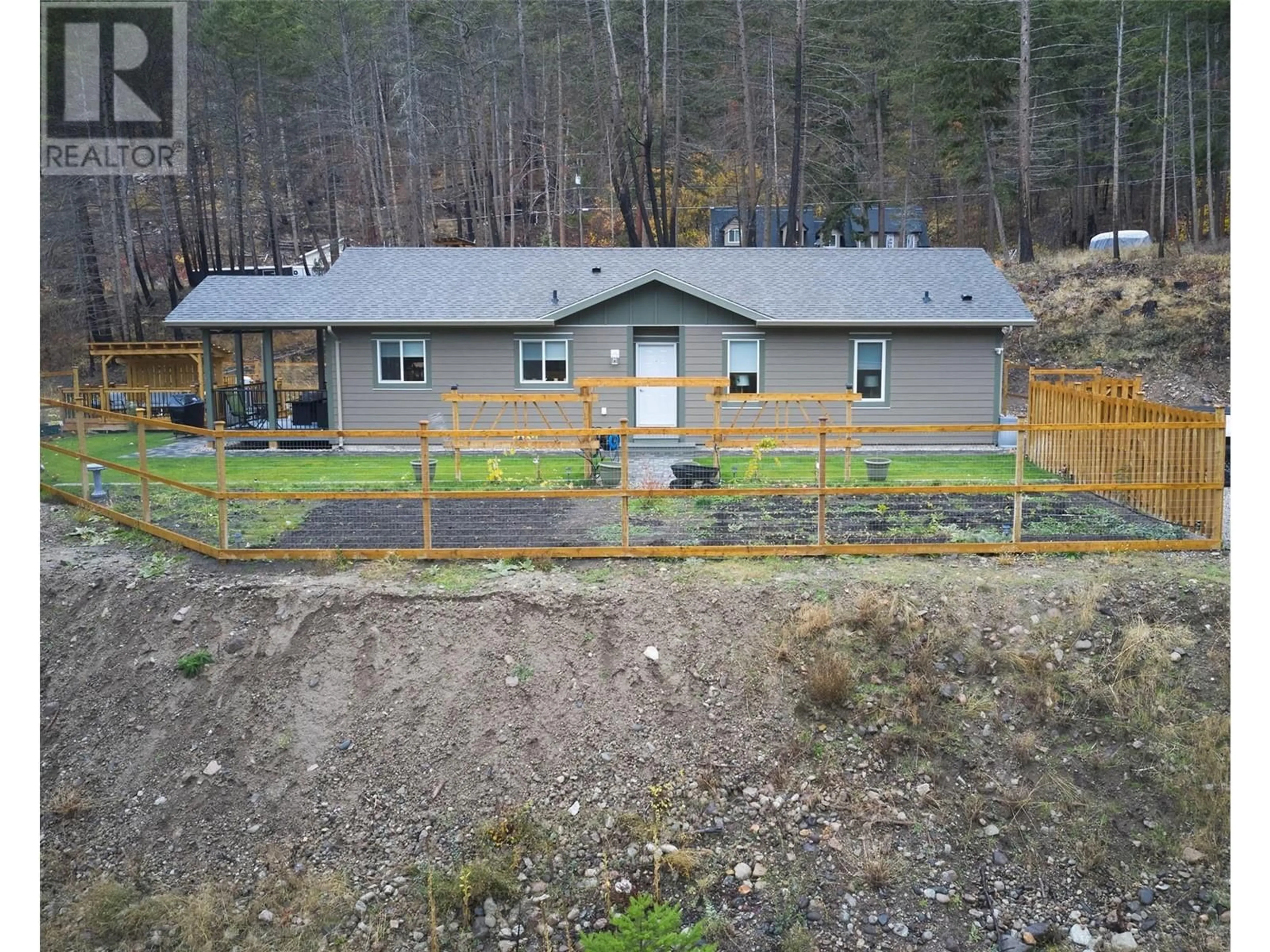 A pic from outside/outdoor area/front of a property/back of a property/a pic from drone, unknown for 9468 HOUGHTON ROAD, Vernon British Columbia V1H2C9
