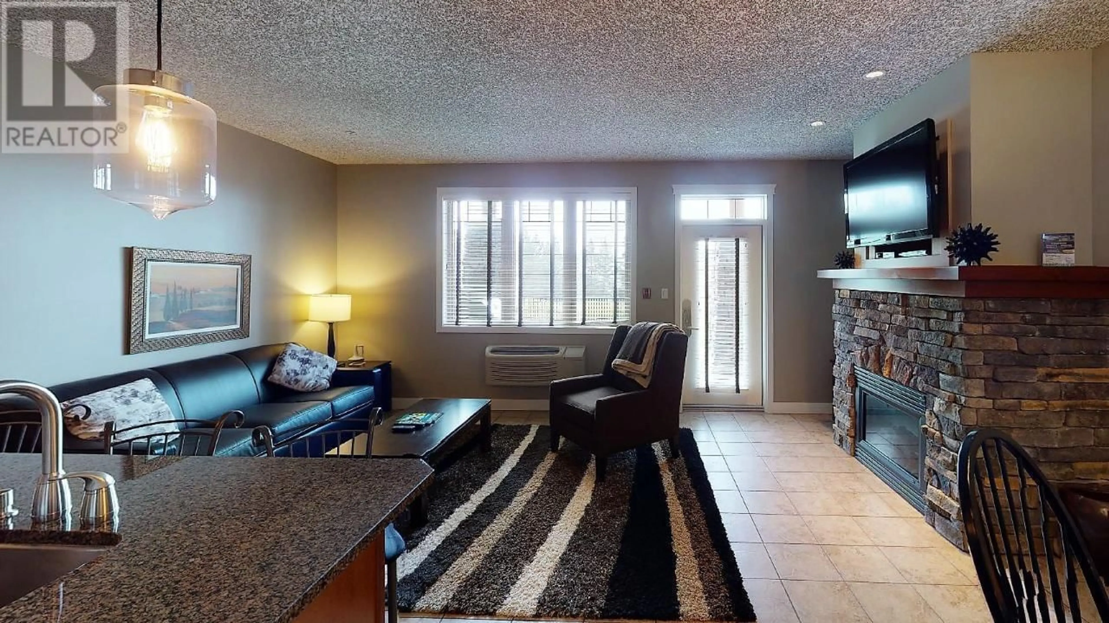 Living room with furniture, unknown for 412 A - 400 BIGHORN BOULEVARD, Radium Hot Springs British Columbia V0A1M0