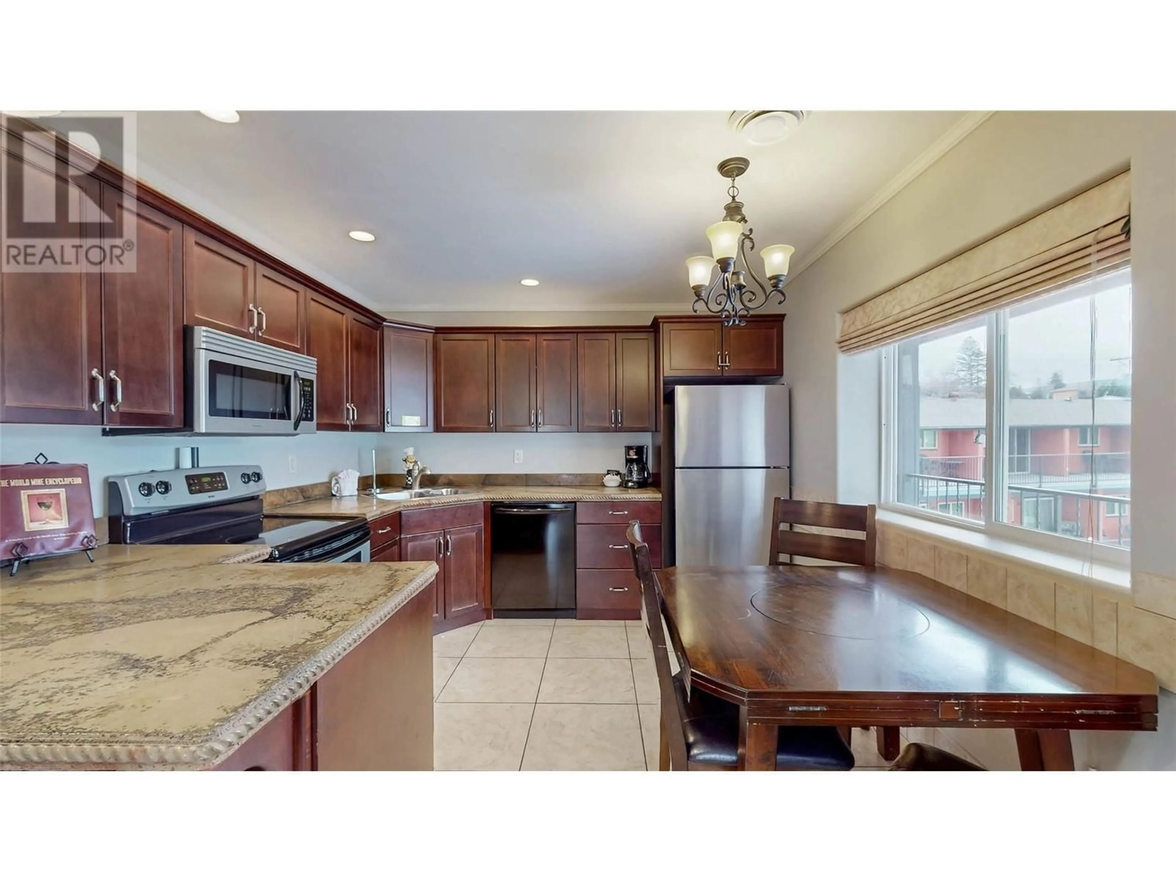 Open concept kitchen, ceramic/tile floor for 500 - 5815 OLEANDER (SL 46) DRIVE, Osoyoos British Columbia V0H1V1