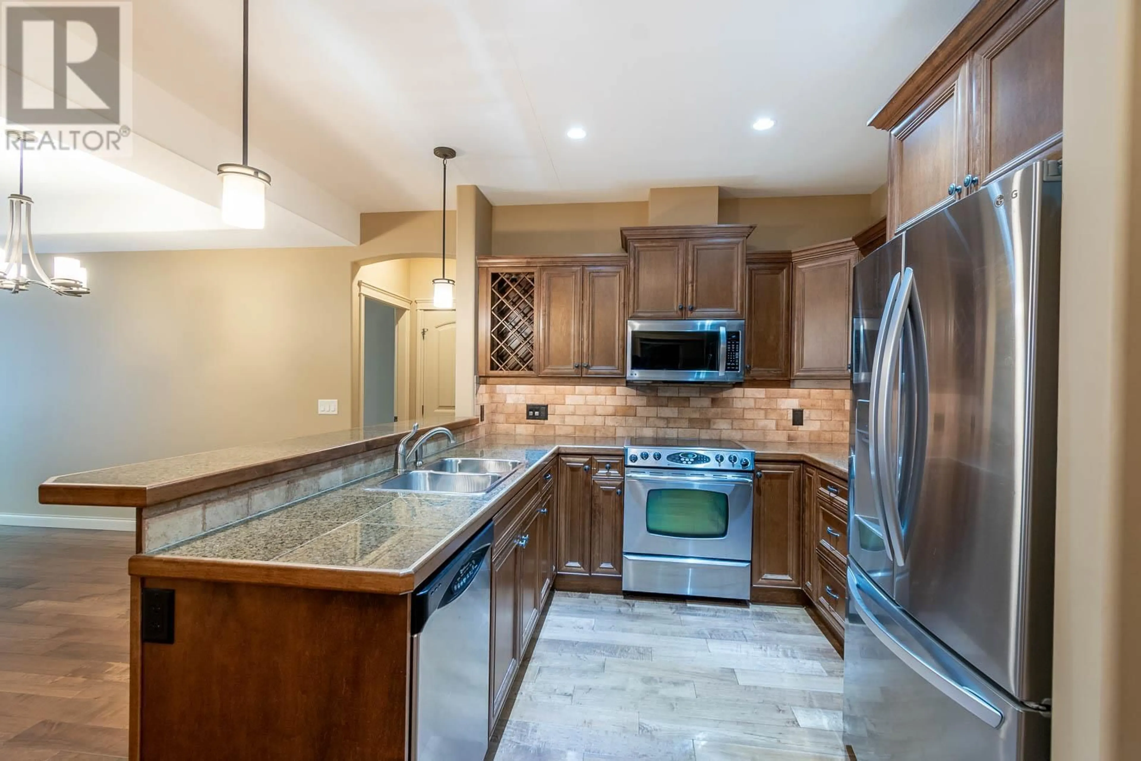 Open concept kitchen, ceramic/tile floor for 206 - 2770 AUBURN ROAD, West Kelowna British Columbia V4T4C2