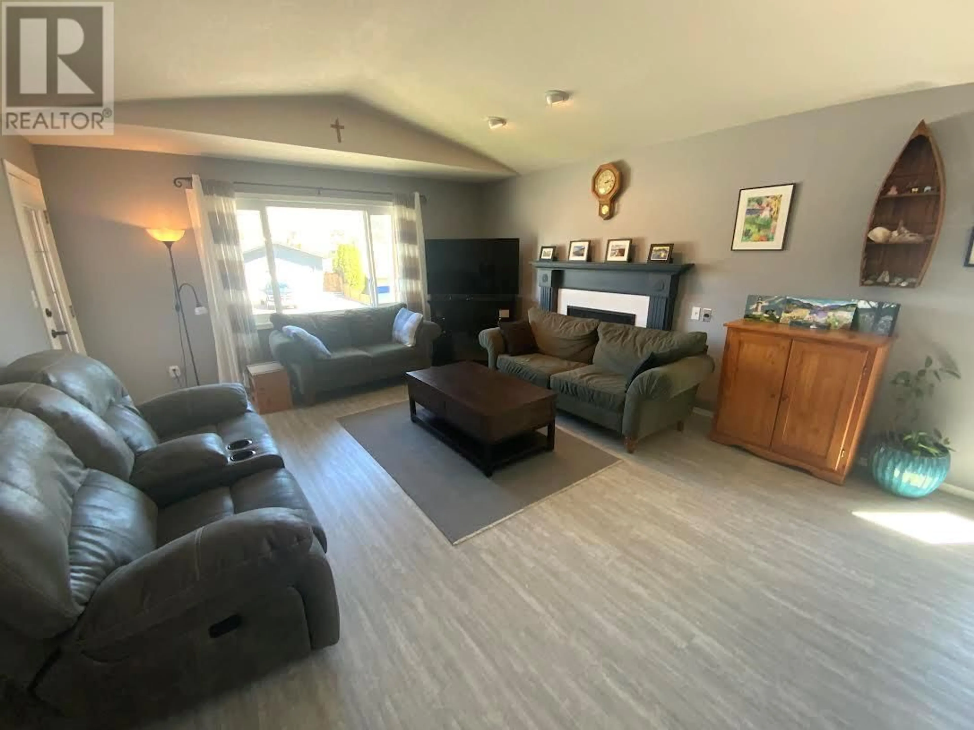 Living room with furniture, unknown for 1843 QUEBEC STREET, Penticton British Columbia V2A6C9