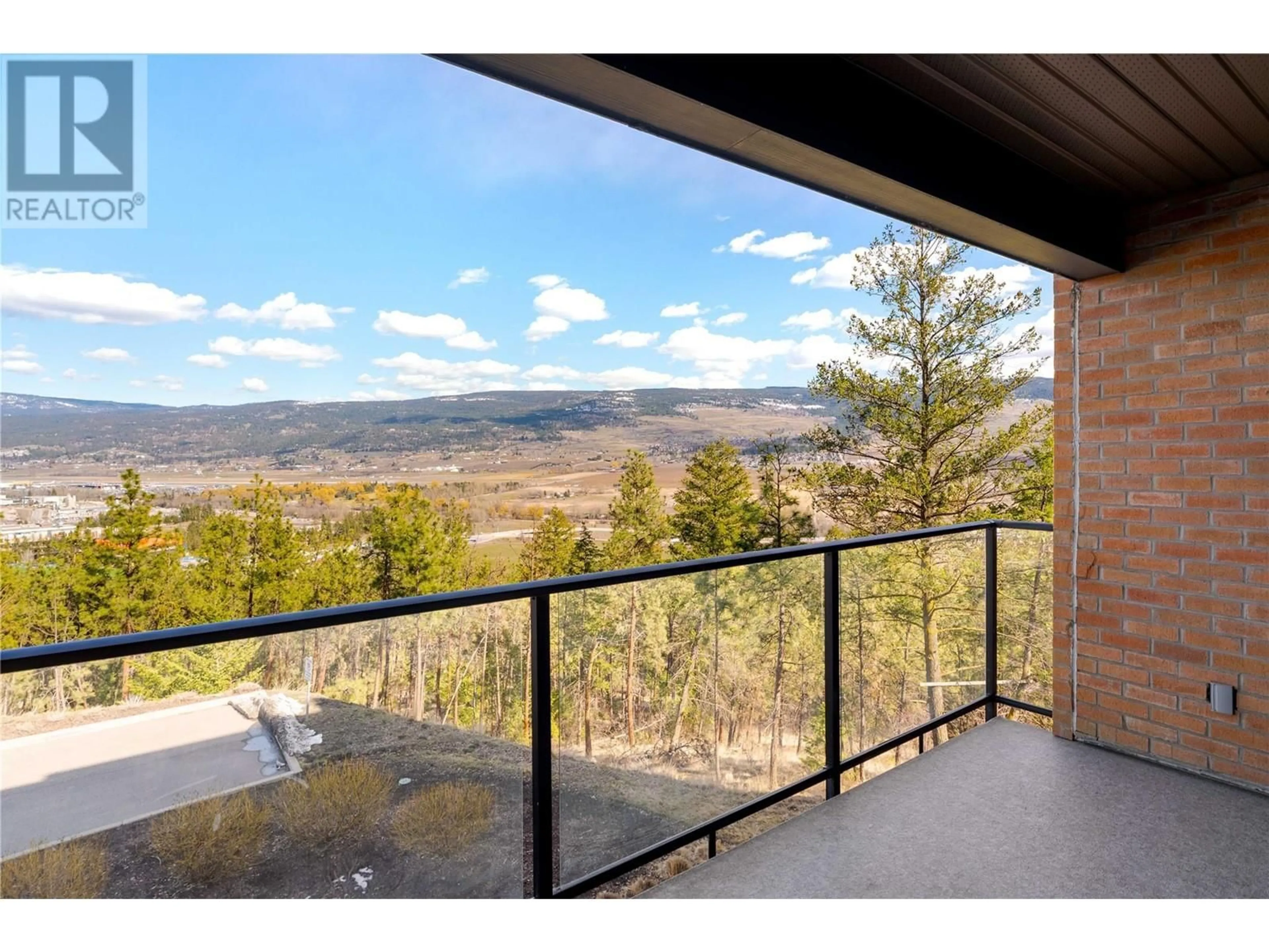 Patio, water/lake/river/ocean view for 203 - 883 ACADEMY WAY, Kelowna British Columbia V1V0A3