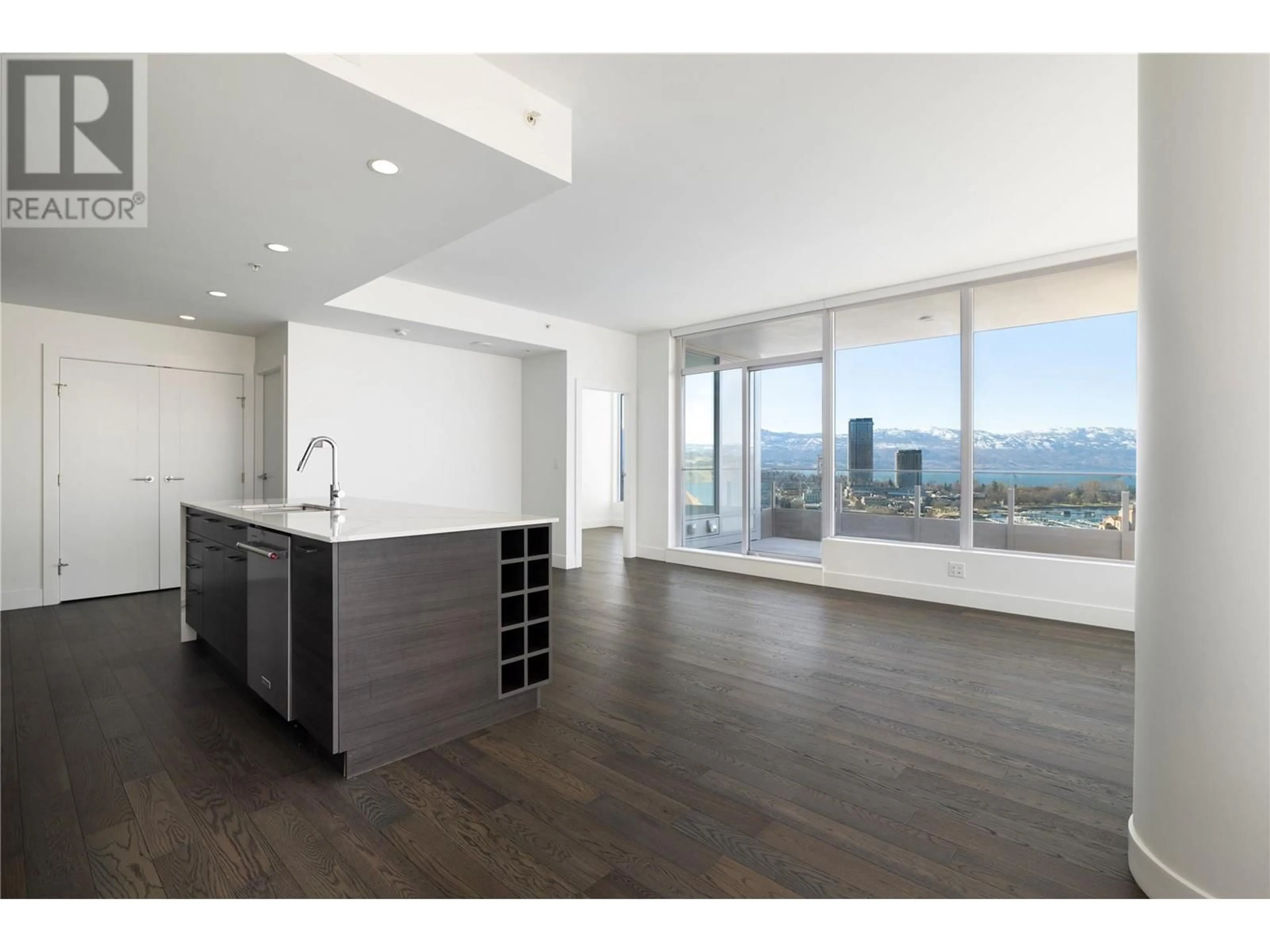 Open concept kitchen, wood/laminate floor for 1905 - 1181 SUNSET DRIVE, Kelowna British Columbia V1Y0J4