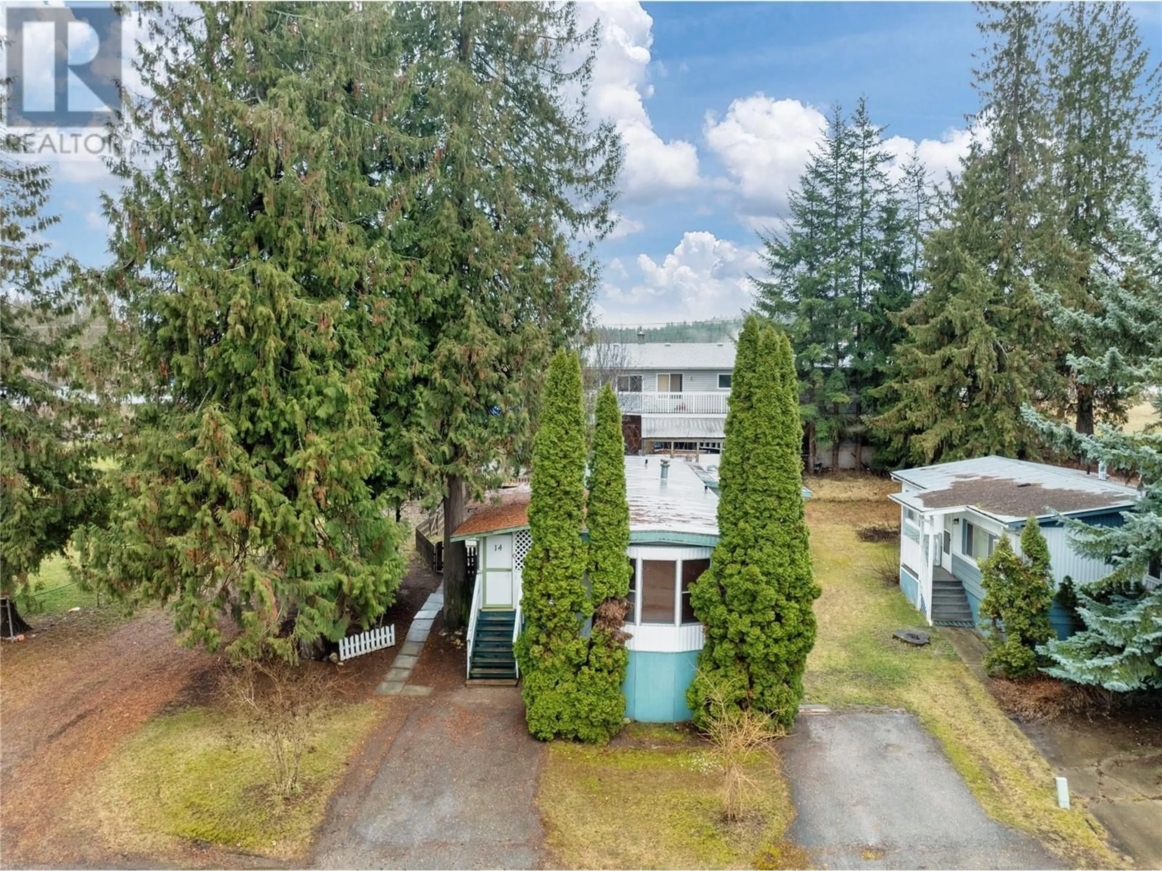 A pic from outside/outdoor area/front of a property/back of a property/a pic from drone, unknown for 14 - 4061 11 AVENUE NORTHEAST, Salmon Arm British Columbia V1E1C7