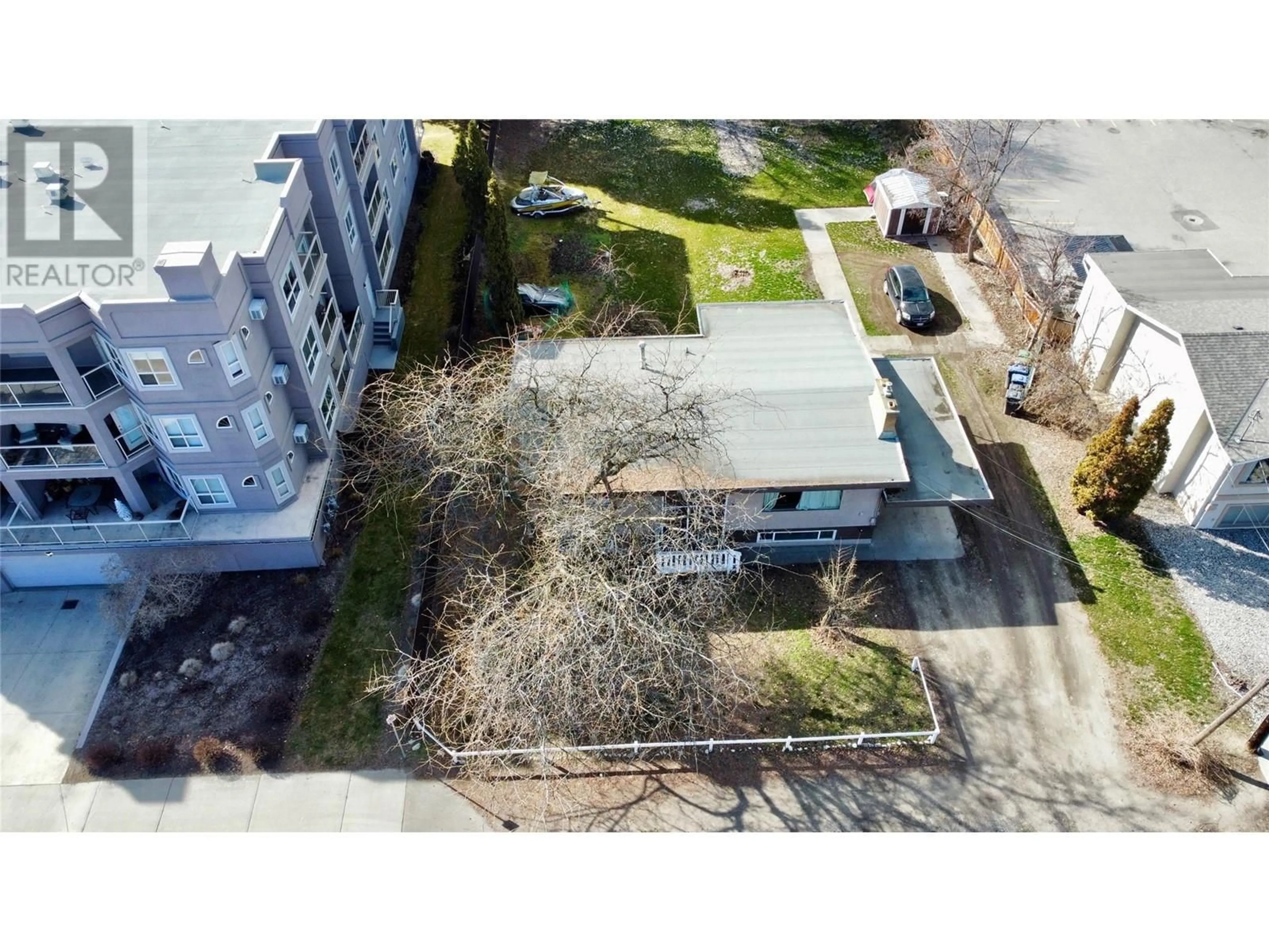 A pic from outside/outdoor area/front of a property/back of a property/a pic from drone, street for 2110 VASILE ROAD, Kelowna British Columbia V1Y6H5