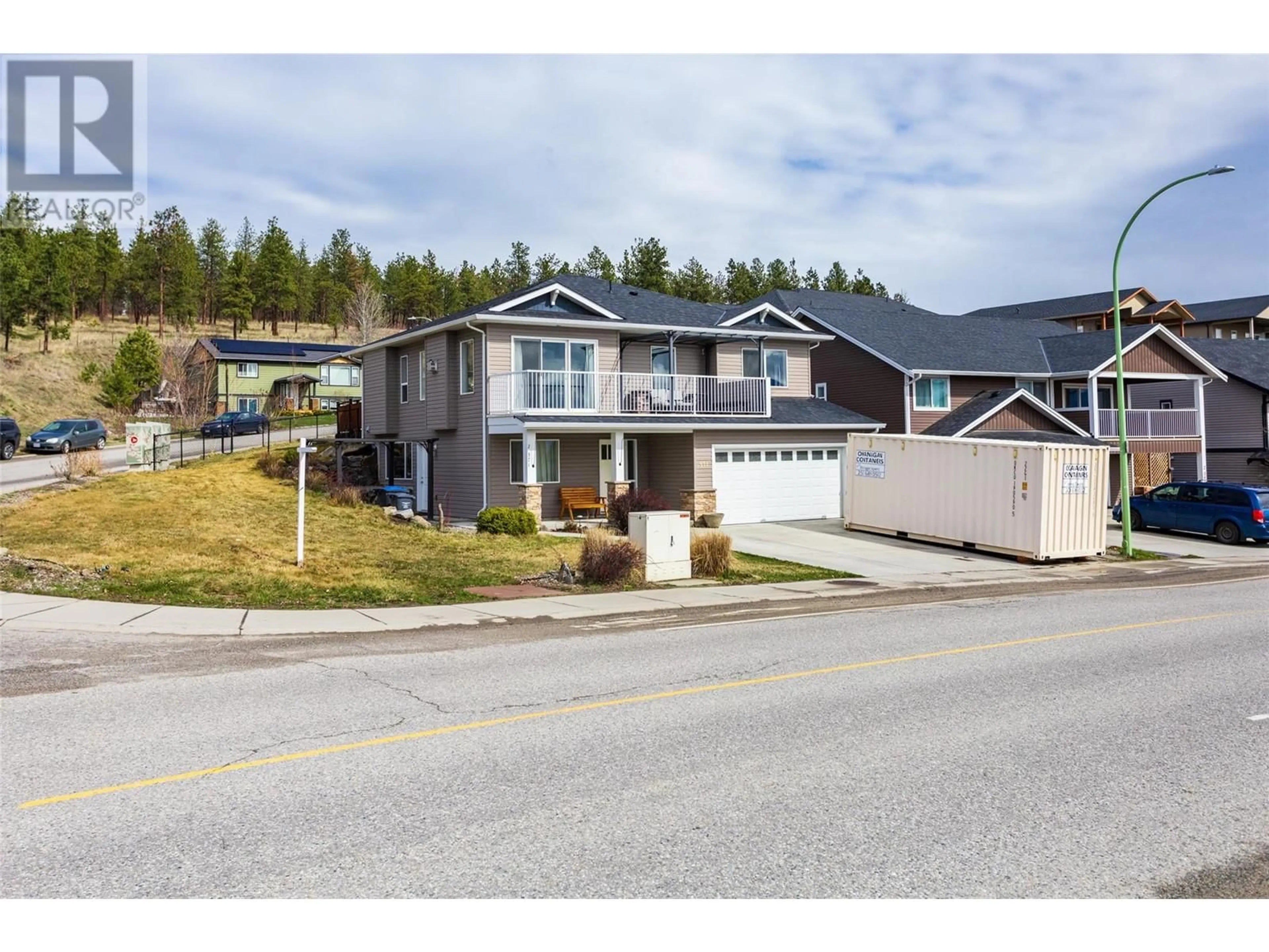 A pic from outside/outdoor area/front of a property/back of a property/a pic from drone, street for 371 ACADEMY WAY, Kelowna British Columbia V1V3A9