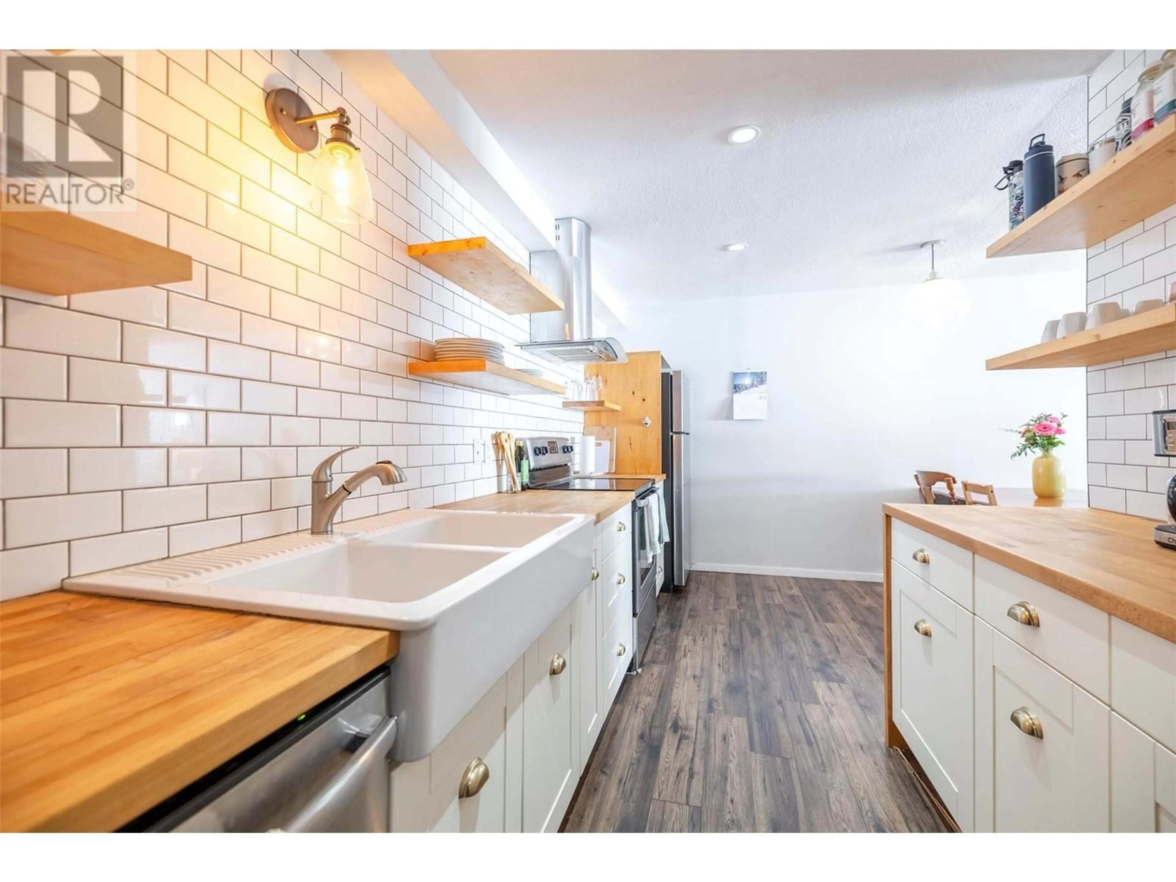 Open concept kitchen, ceramic/tile floor for 103 - 30 RIDGEMONT AVENUE OTHER, Fernie British Columbia V0B1M2