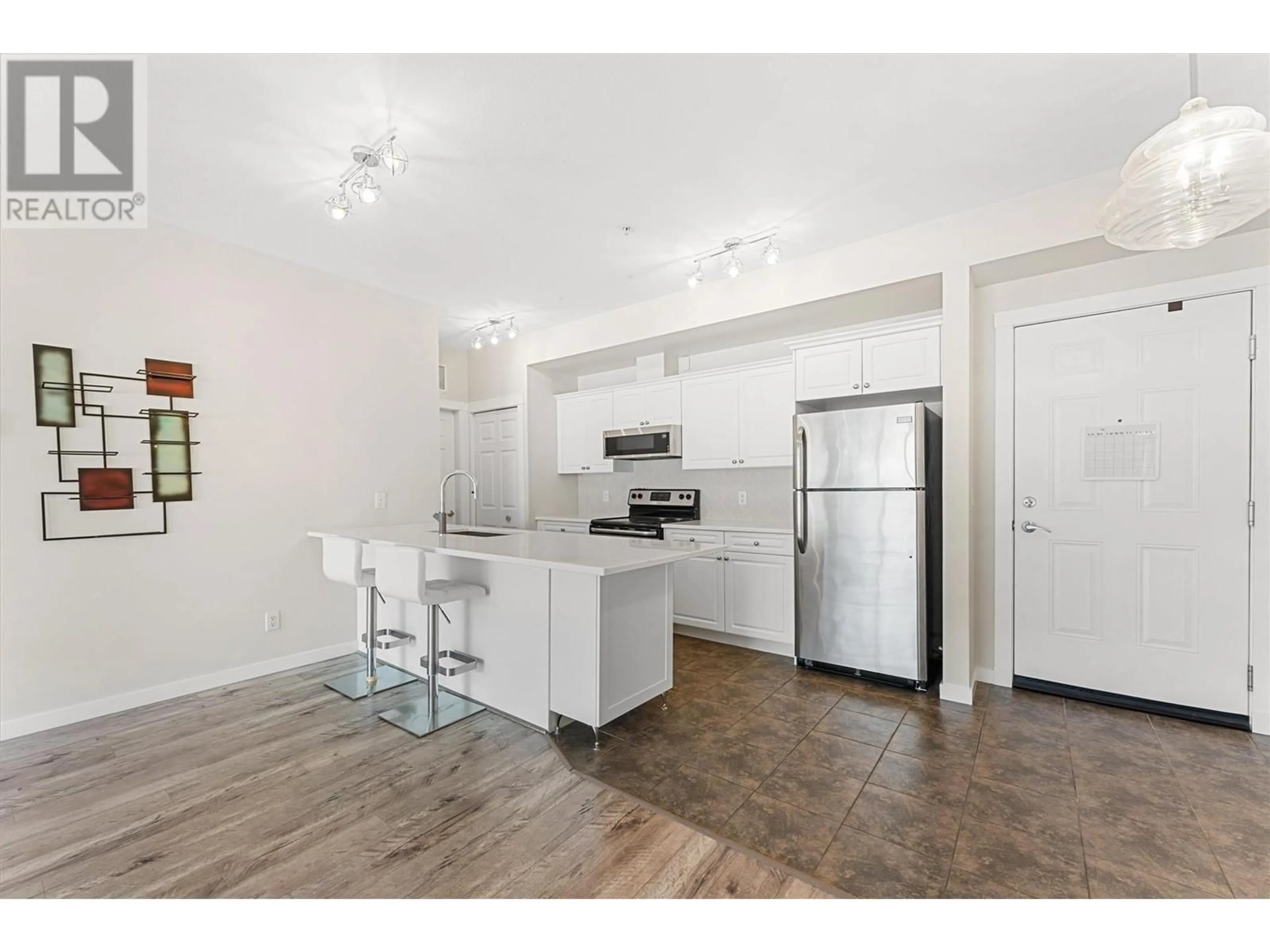 Open concept kitchen, unknown for 303 - 3550 WOODSDALE ROAD, Lake Country British Columbia V4V1Y9