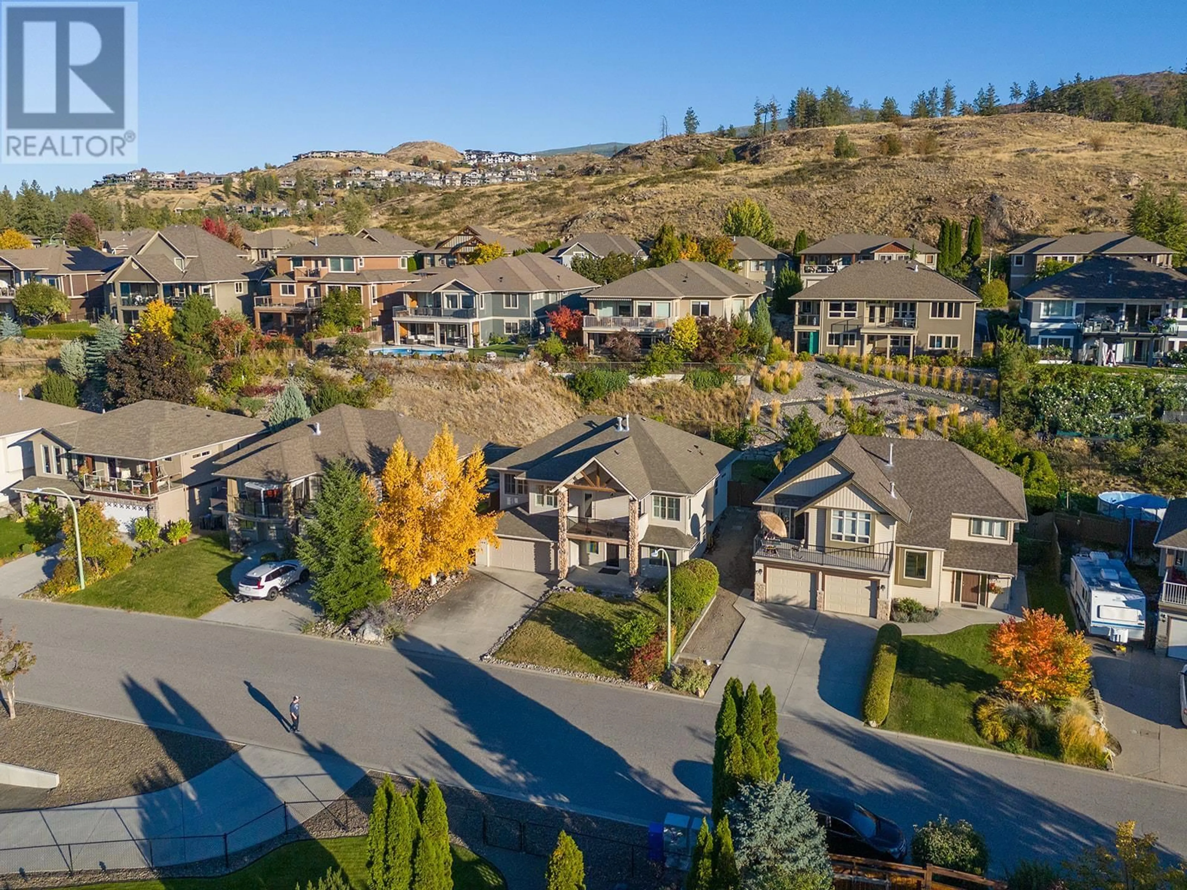 A pic from outside/outdoor area/front of a property/back of a property/a pic from drone, mountain view for 5199 COBBLE CRESCENT, Kelowna British Columbia V1W4Y8