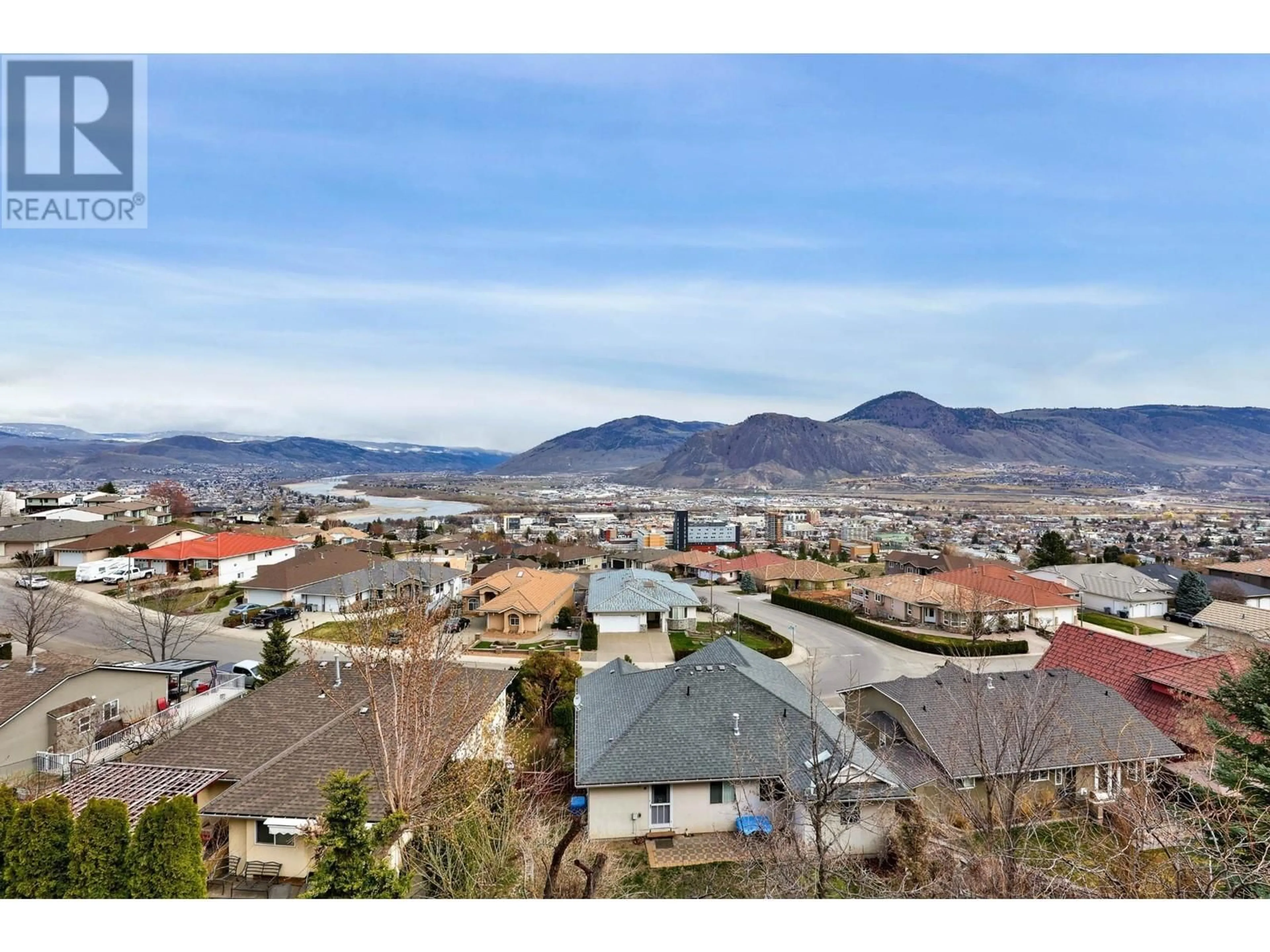 A pic from outside/outdoor area/front of a property/back of a property/a pic from drone, mountain view for 62 ARROWSTONE DRIVE, Kamloops British Columbia V2C6P9