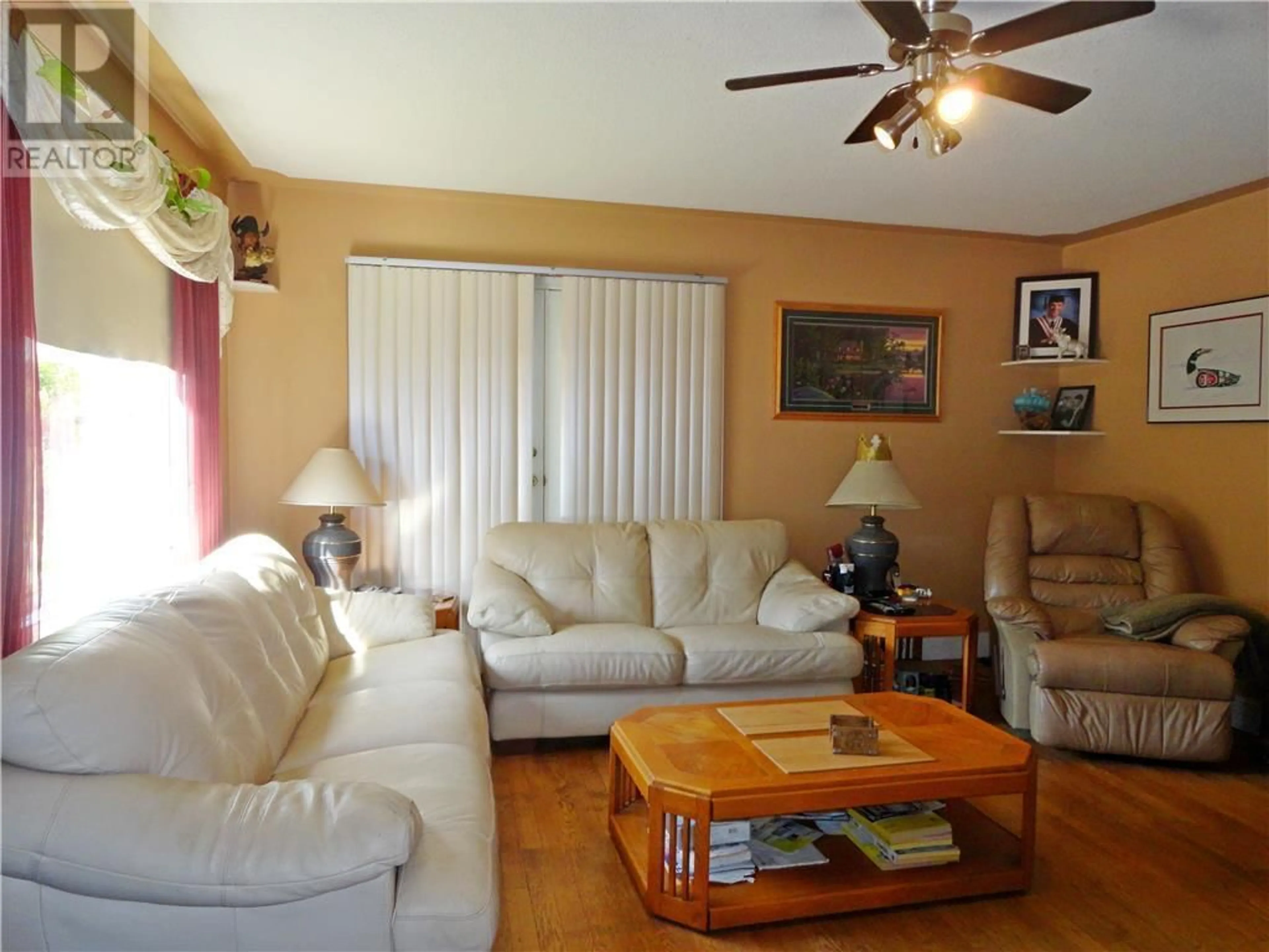 Living room with furniture, wood/laminate floor for 2895 CHASE FALKLAND ROAD, Falkland British Columbia V0E1W0