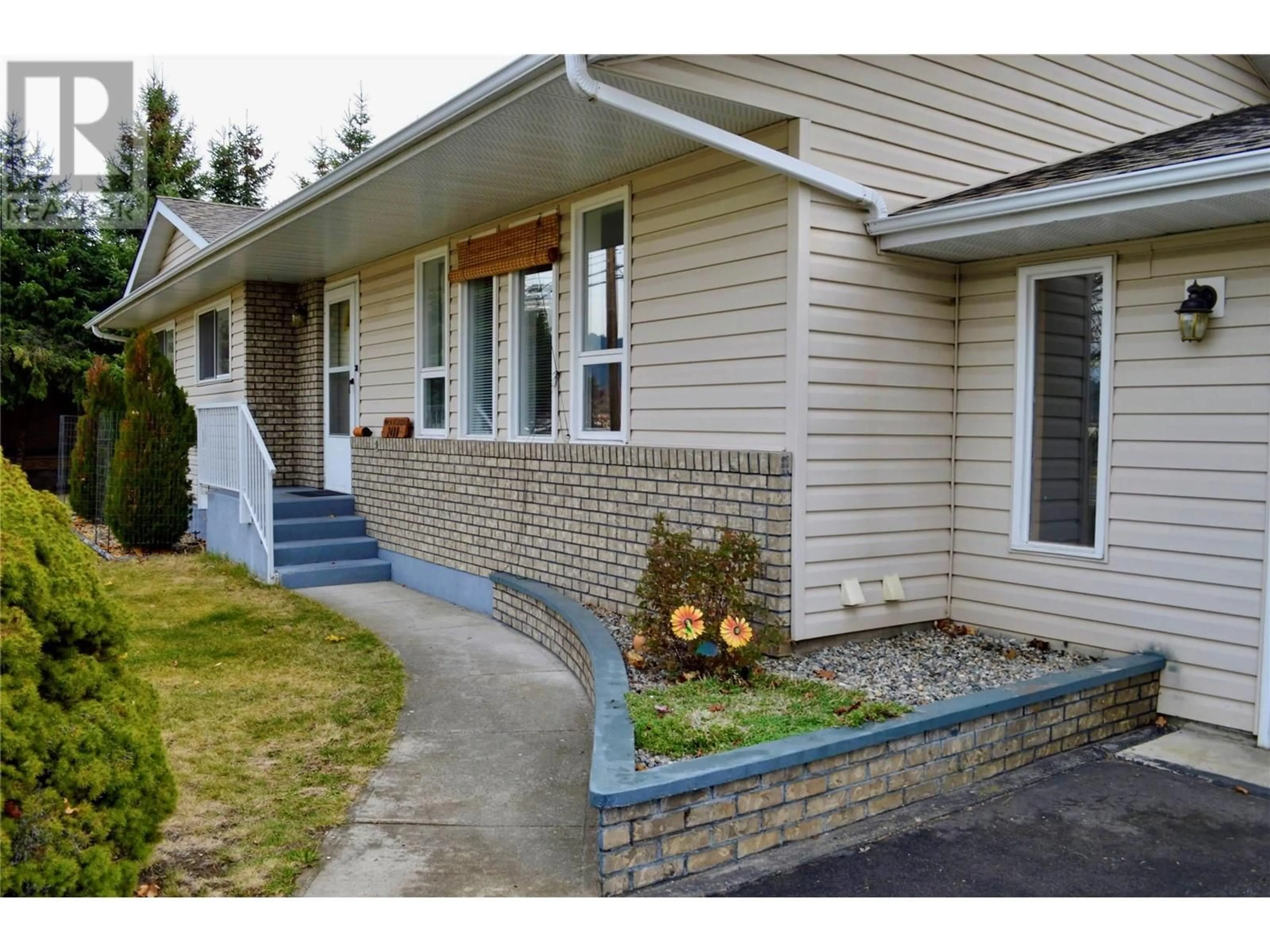 Home with vinyl exterior material, street for 2480 75TH AVENUE, Grand Forks British Columbia V0H1H2