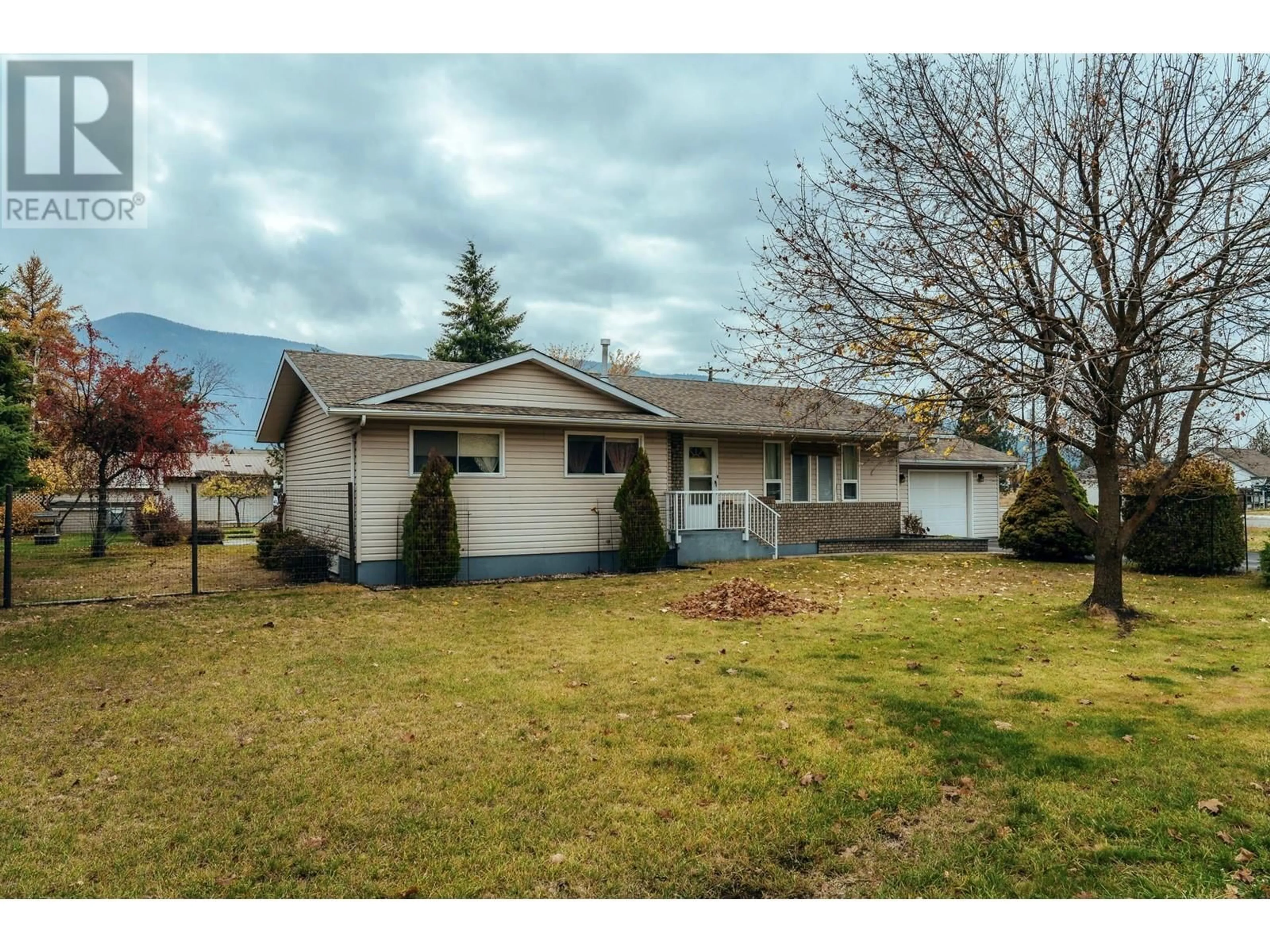 A pic from outside/outdoor area/front of a property/back of a property/a pic from drone, street for 2480 75TH AVENUE, Grand Forks British Columbia V0H1H2