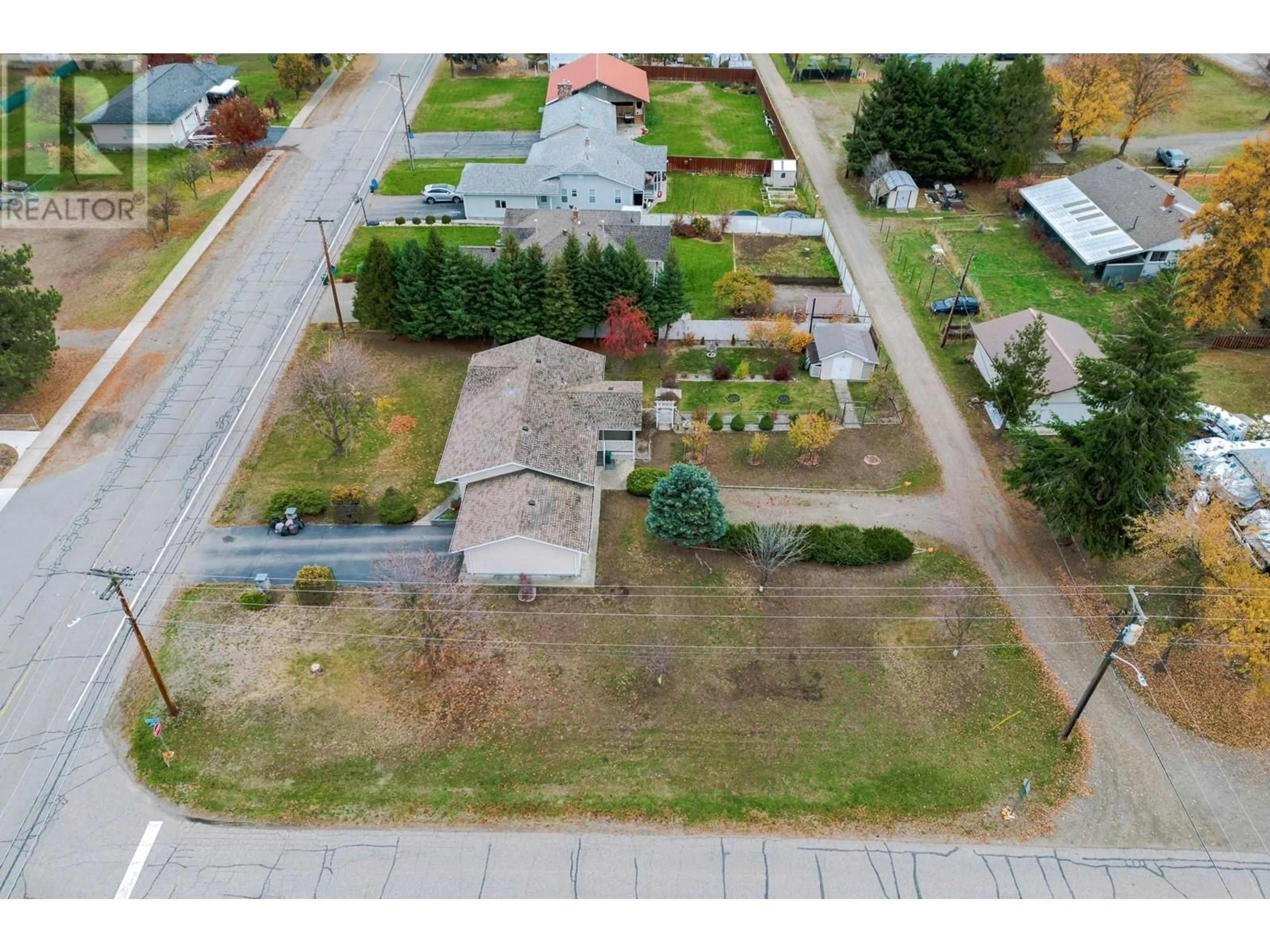 A pic from outside/outdoor area/front of a property/back of a property/a pic from drone, street for 2480 75TH AVENUE, Grand Forks British Columbia V0H1H2
