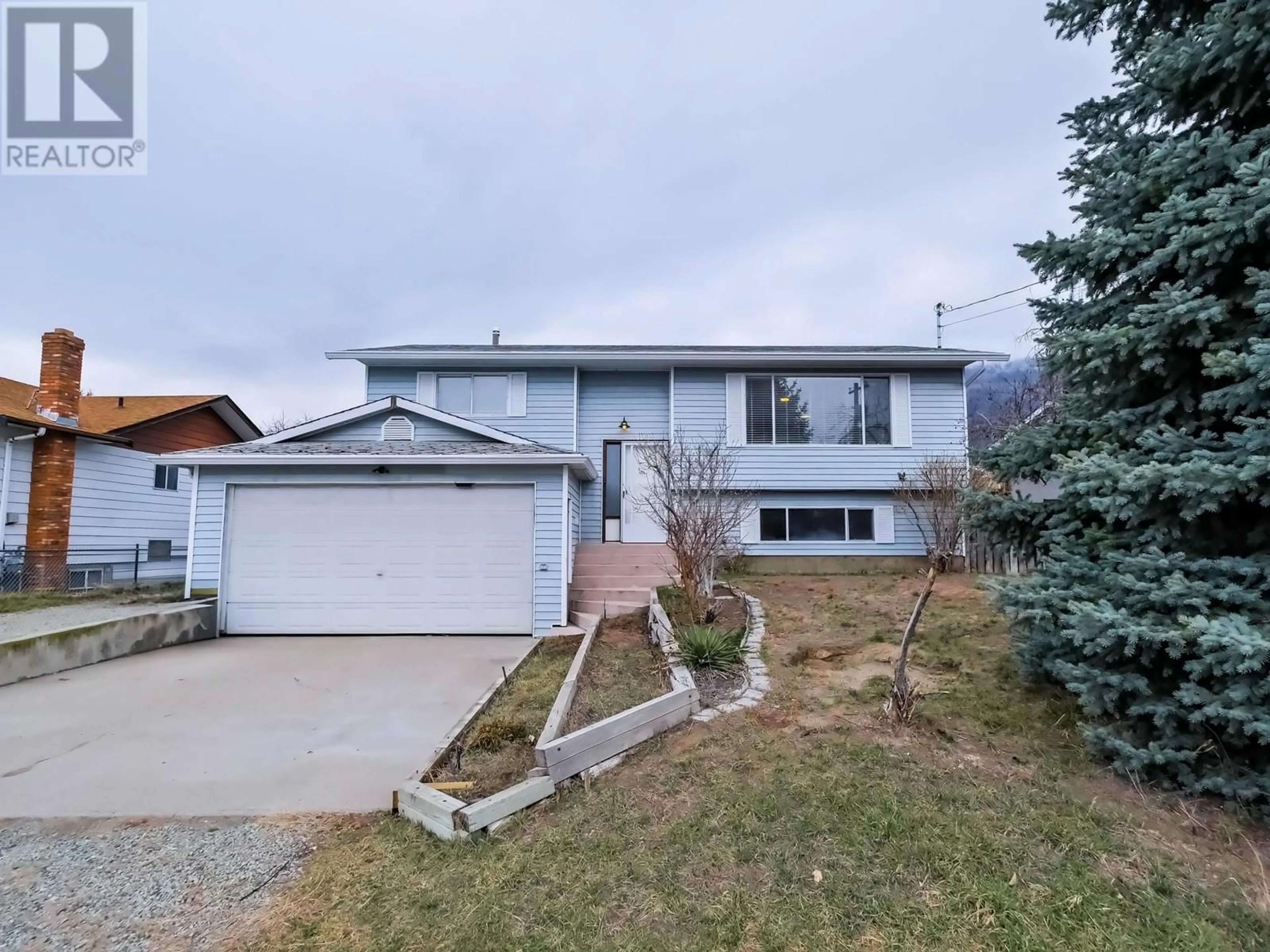 Home with vinyl exterior material, mountain view for 11 WILLOW CRESCENT, Osoyoos British Columbia V0H1V3