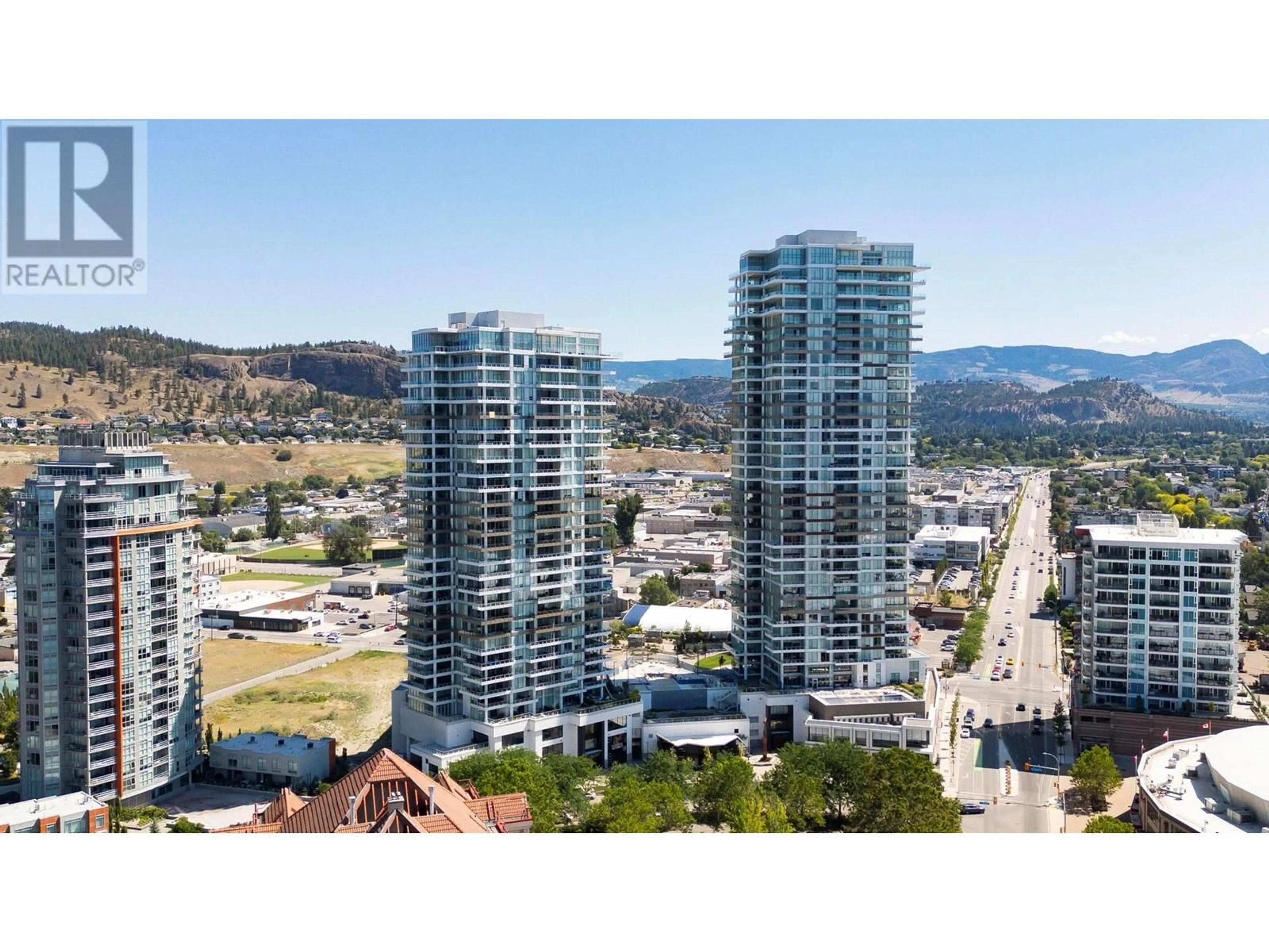 A pic from outside/outdoor area/front of a property/back of a property/a pic from drone, city buildings view from balcony for 1306 - 1181 SUNSET DRIVE, Kelowna British Columbia V1Y0L4