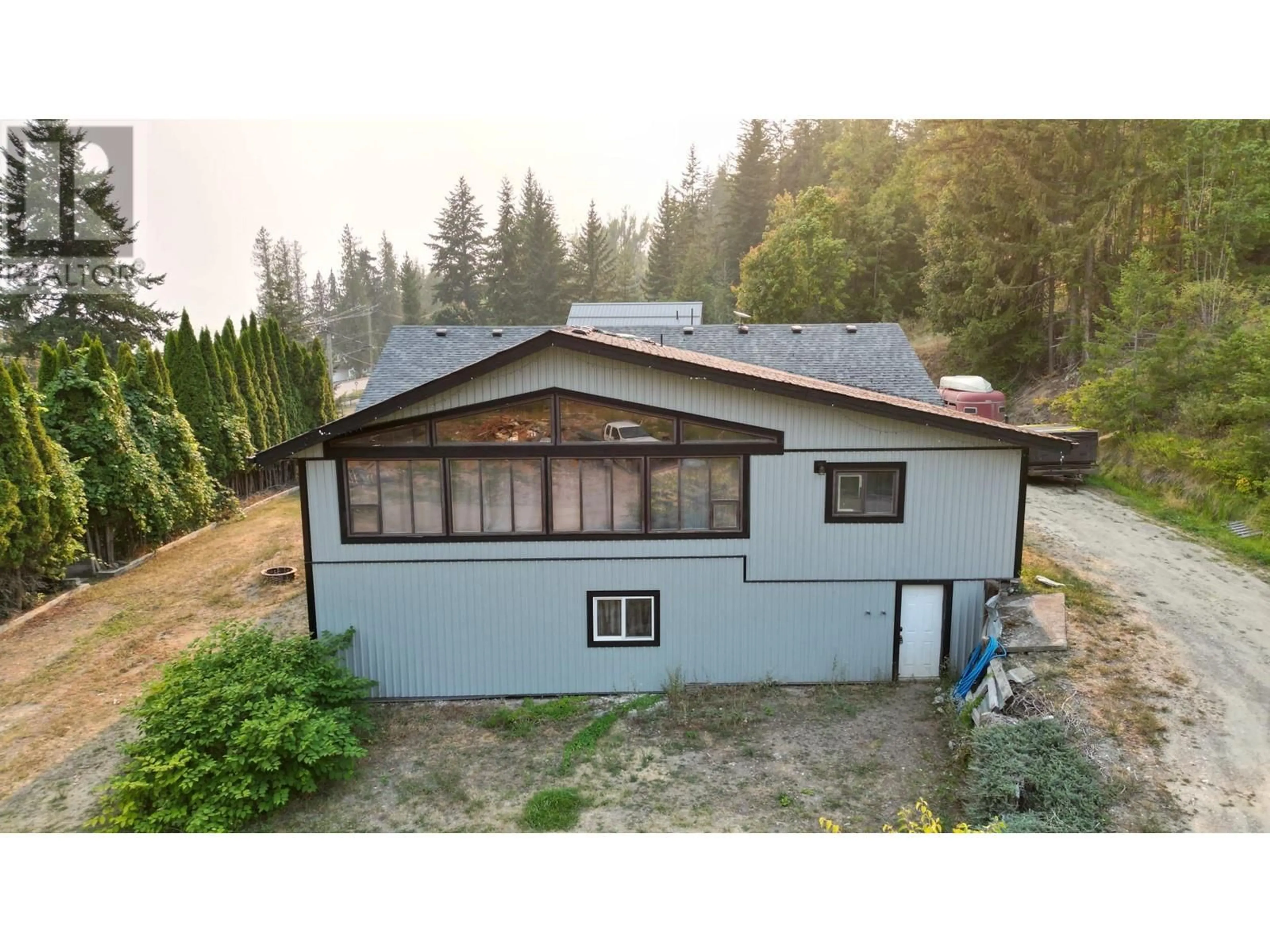 A pic from outside/outdoor area/front of a property/back of a property/a pic from drone, mountain view for 6791 CHARLESON ROAD, Magna Bay British Columbia V0E1L0