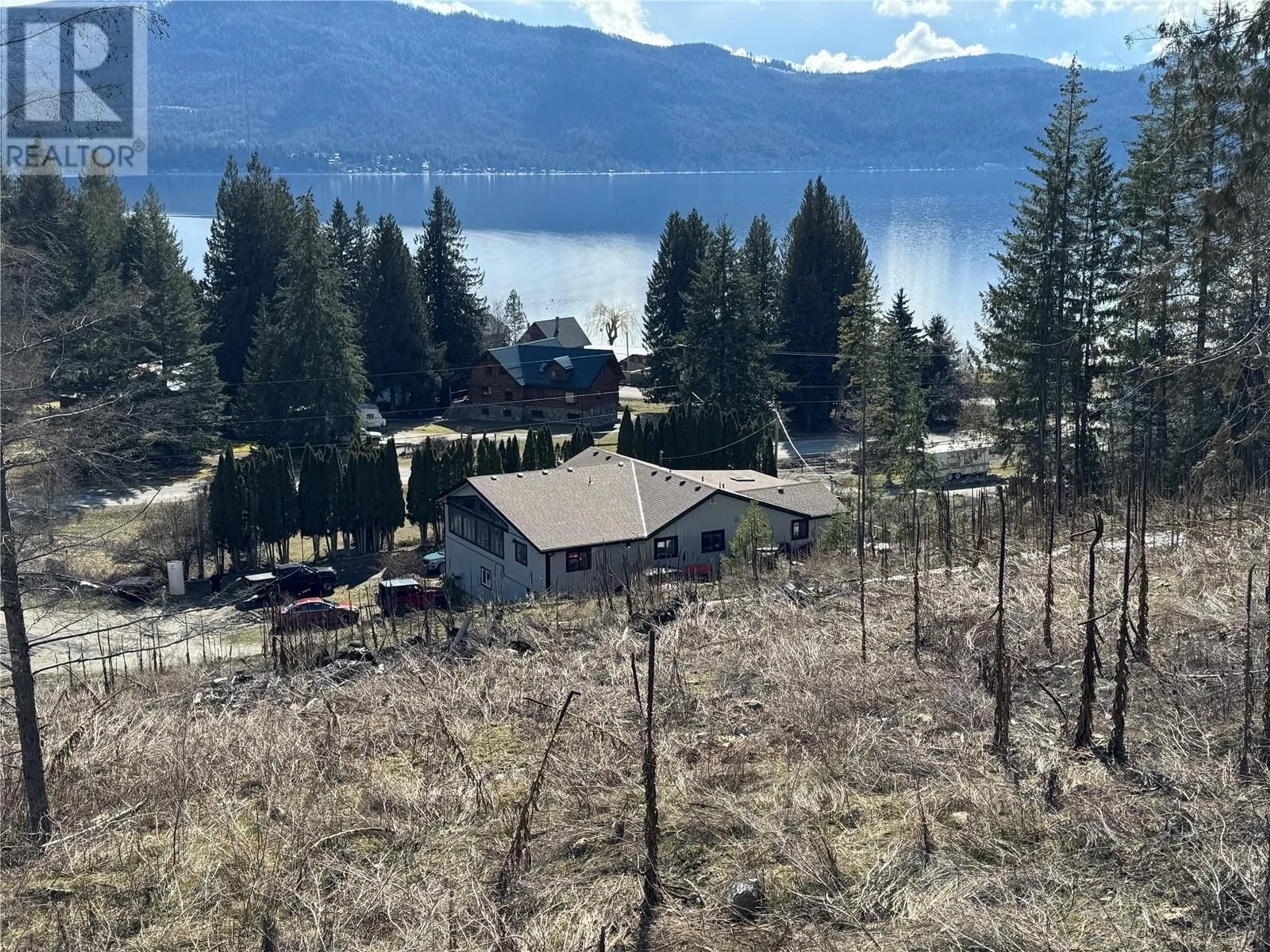 A pic from outside/outdoor area/front of a property/back of a property/a pic from drone, water/lake/river/ocean view for 6791 CHARLESON ROAD, Magna Bay British Columbia V0E1L0