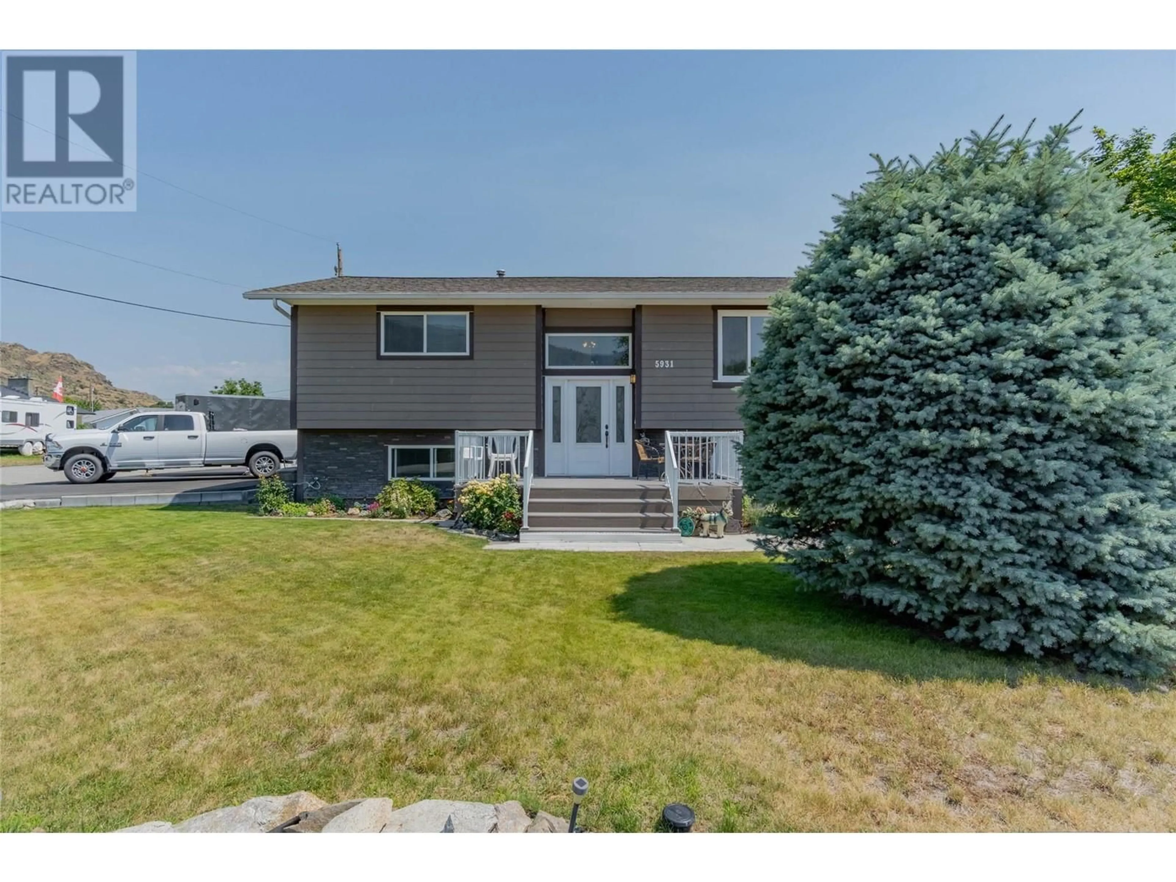Home with vinyl exterior material, street for 5913 DIVIDEND STREET, Oliver British Columbia V0H1T6