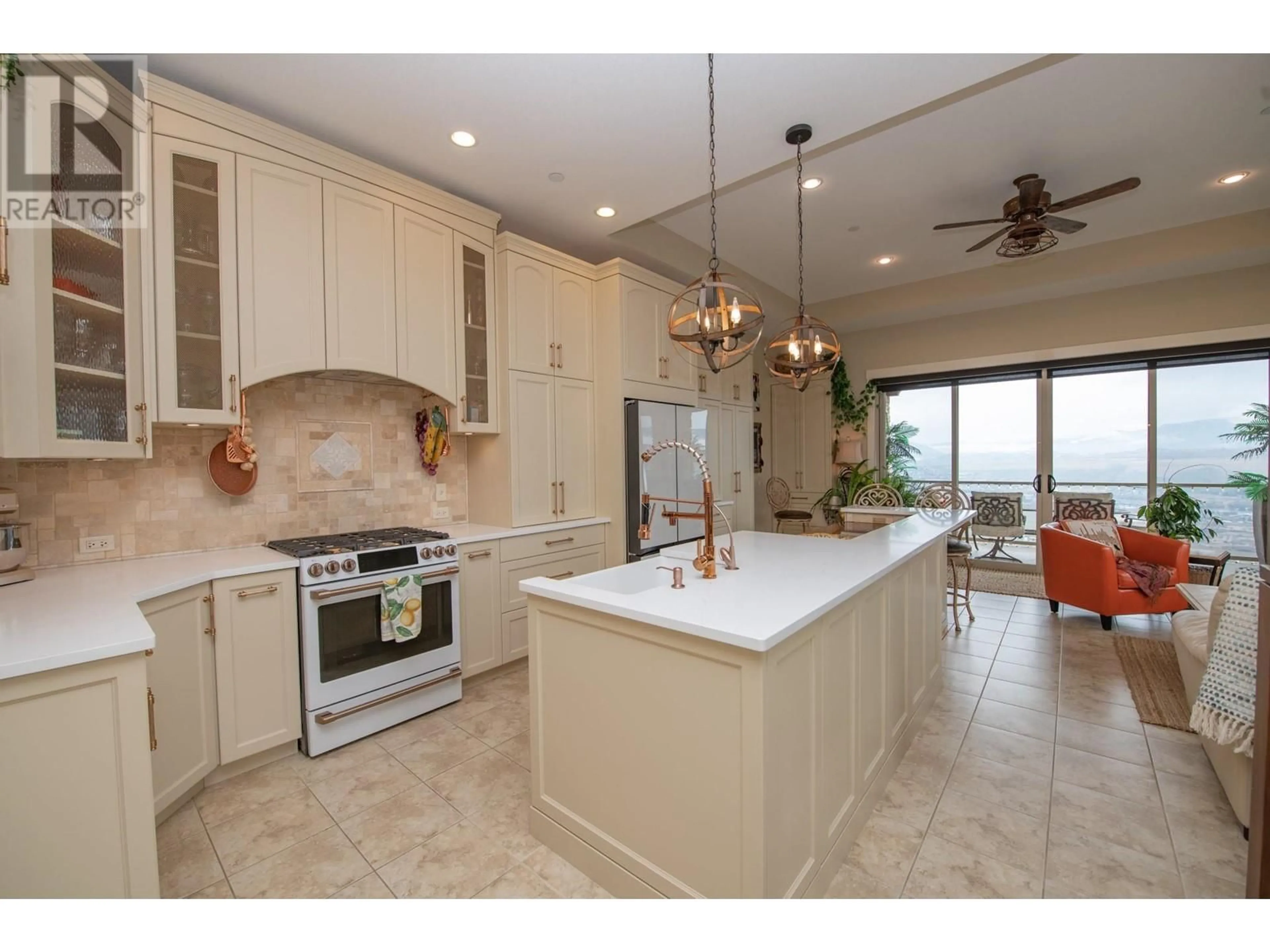 Open concept kitchen, ceramic/tile floor for 325 CORDON PLACE, Vernon British Columbia V1H1Z9