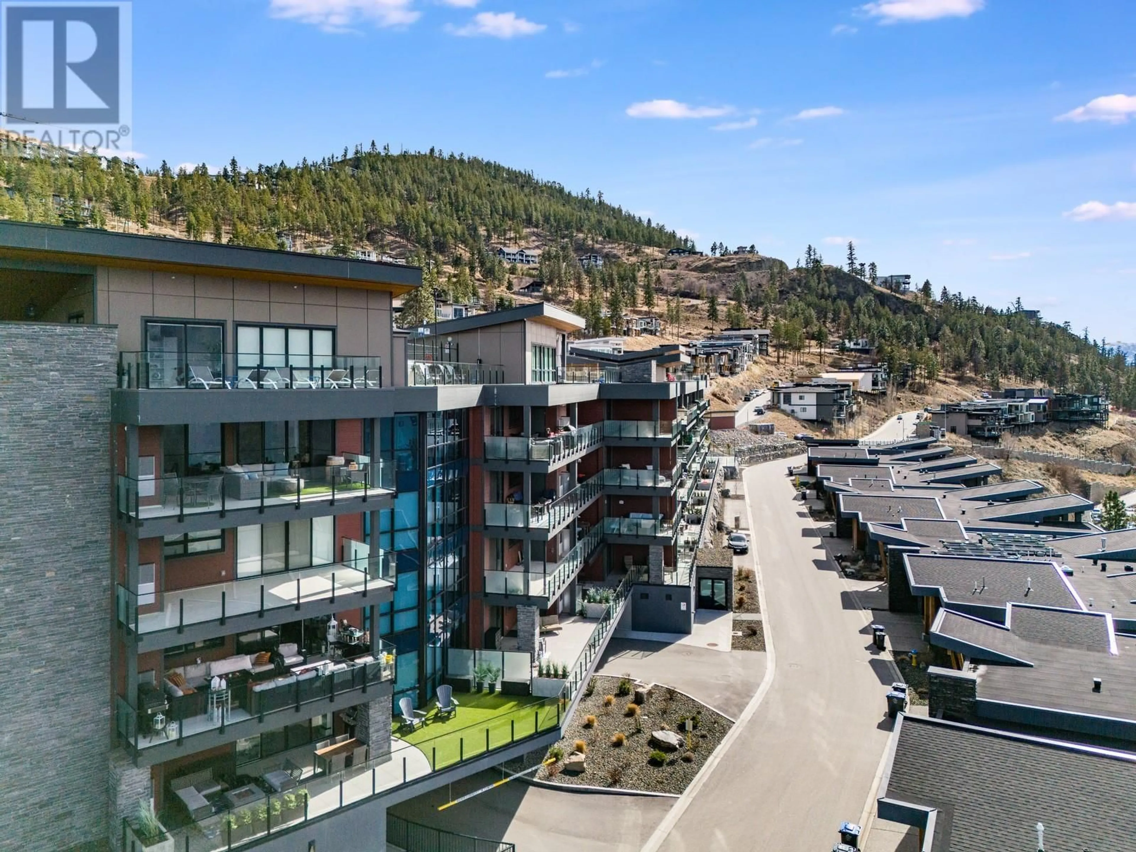 A pic from outside/outdoor area/front of a property/back of a property/a pic from drone, mountain view for 108 - 3475 GRANITE CLOSE, Kelowna British Columbia V1V0B9