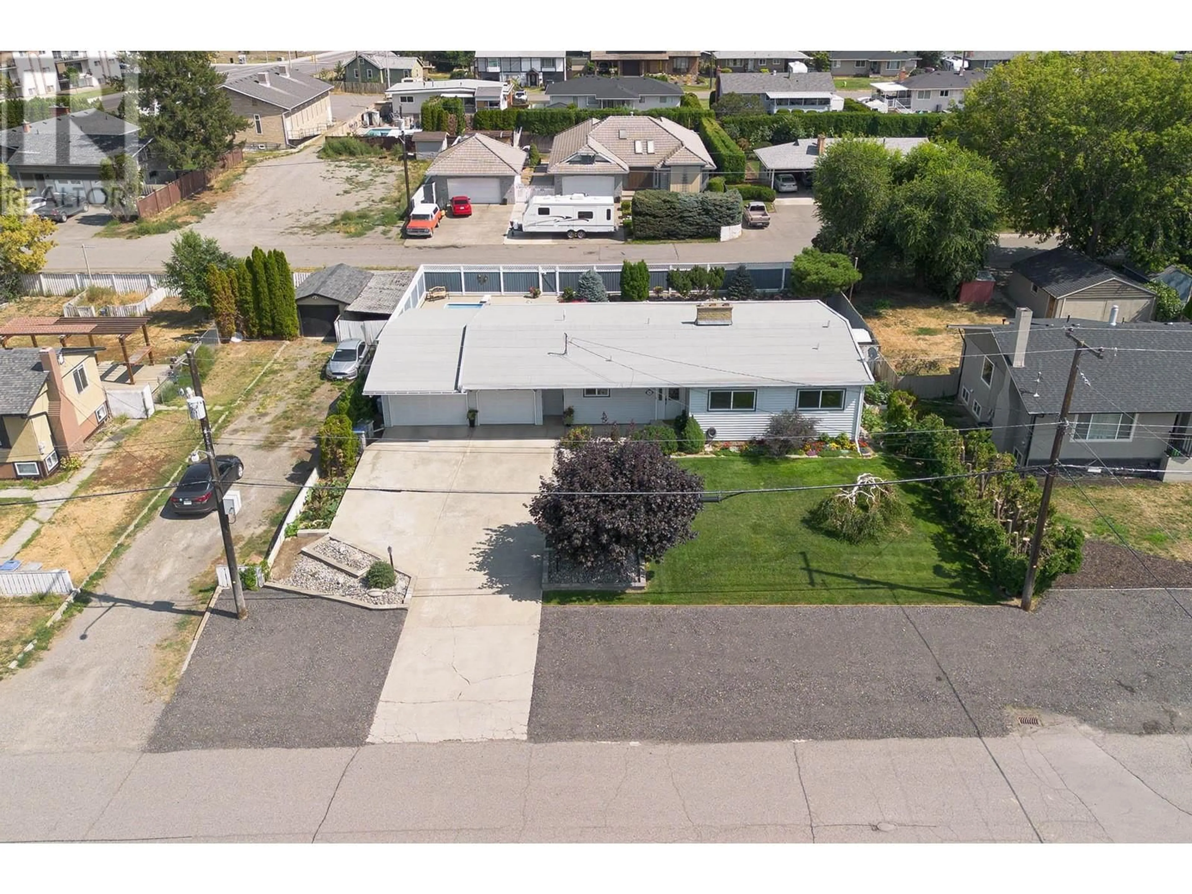 A pic from outside/outdoor area/front of a property/back of a property/a pic from drone, street for 765 POPP STREET, Kamloops British Columbia V2B5A6