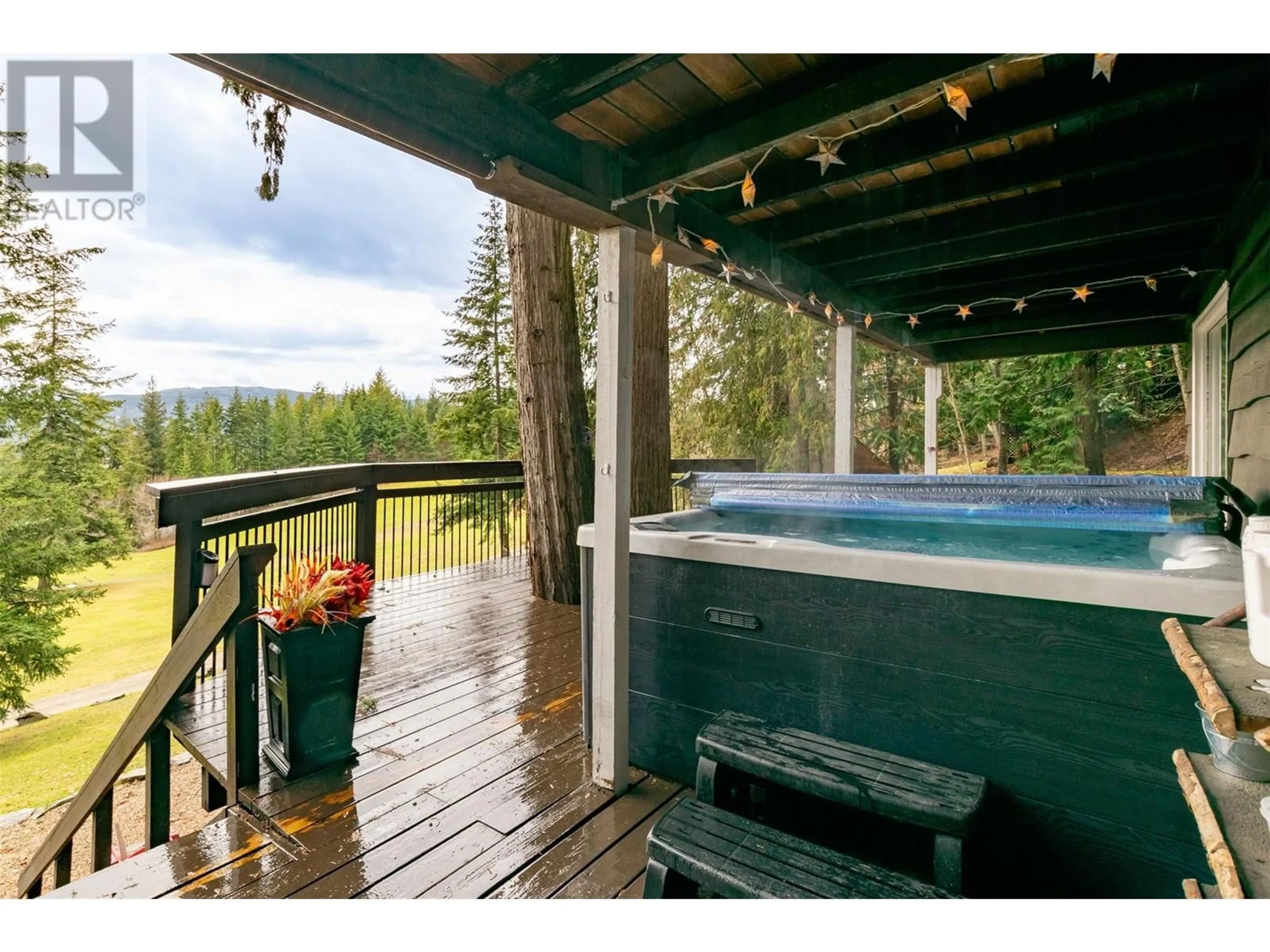 Patio, water/lake/river/ocean view for 7796 COLUMBIA DRIVE, Anglemont British Columbia V0E1M8