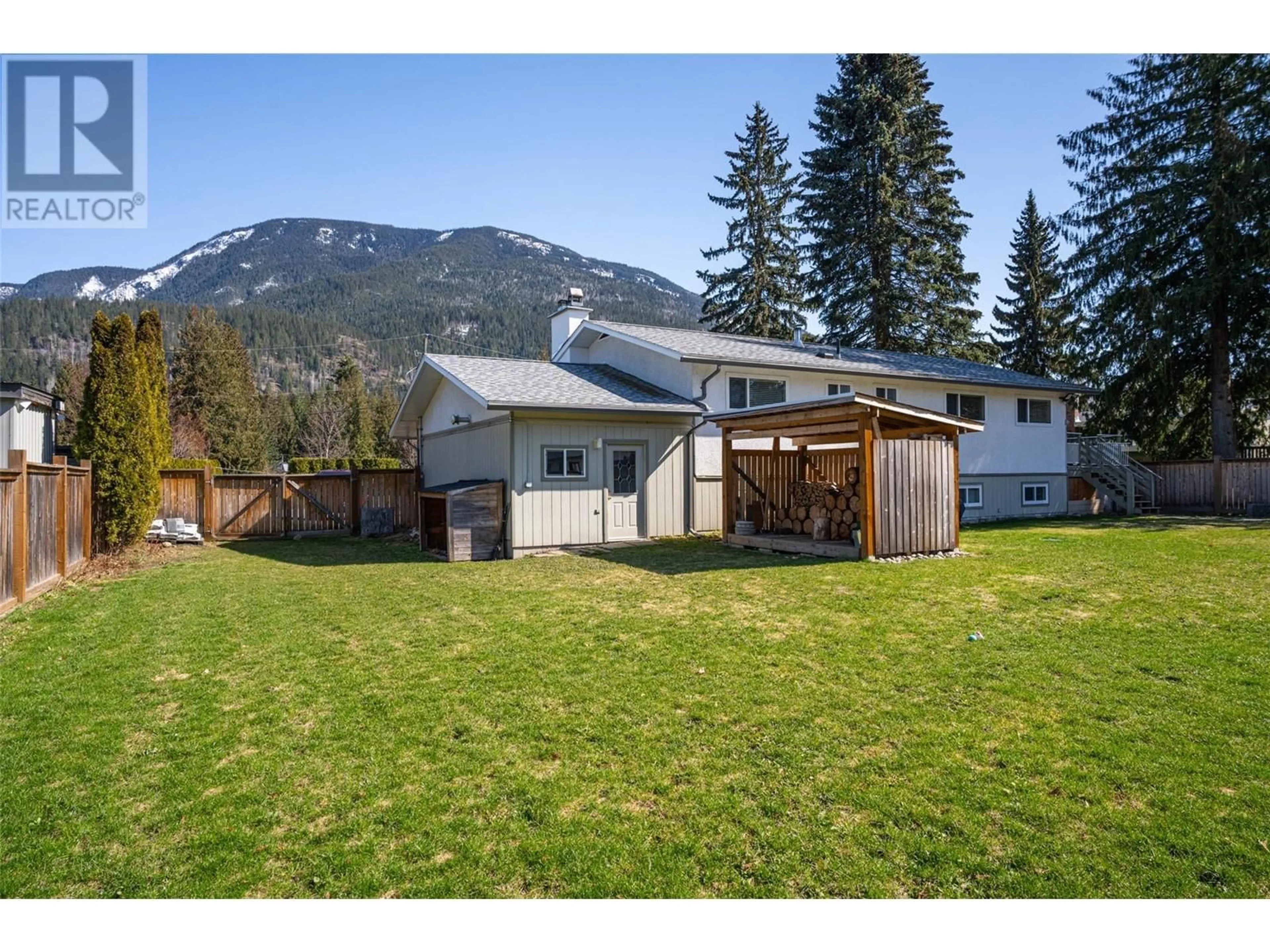 A pic from outside/outdoor area/front of a property/back of a property/a pic from drone, mountain view for 1727 TILLEN ROAD, Revelstoke British Columbia V0E2S1