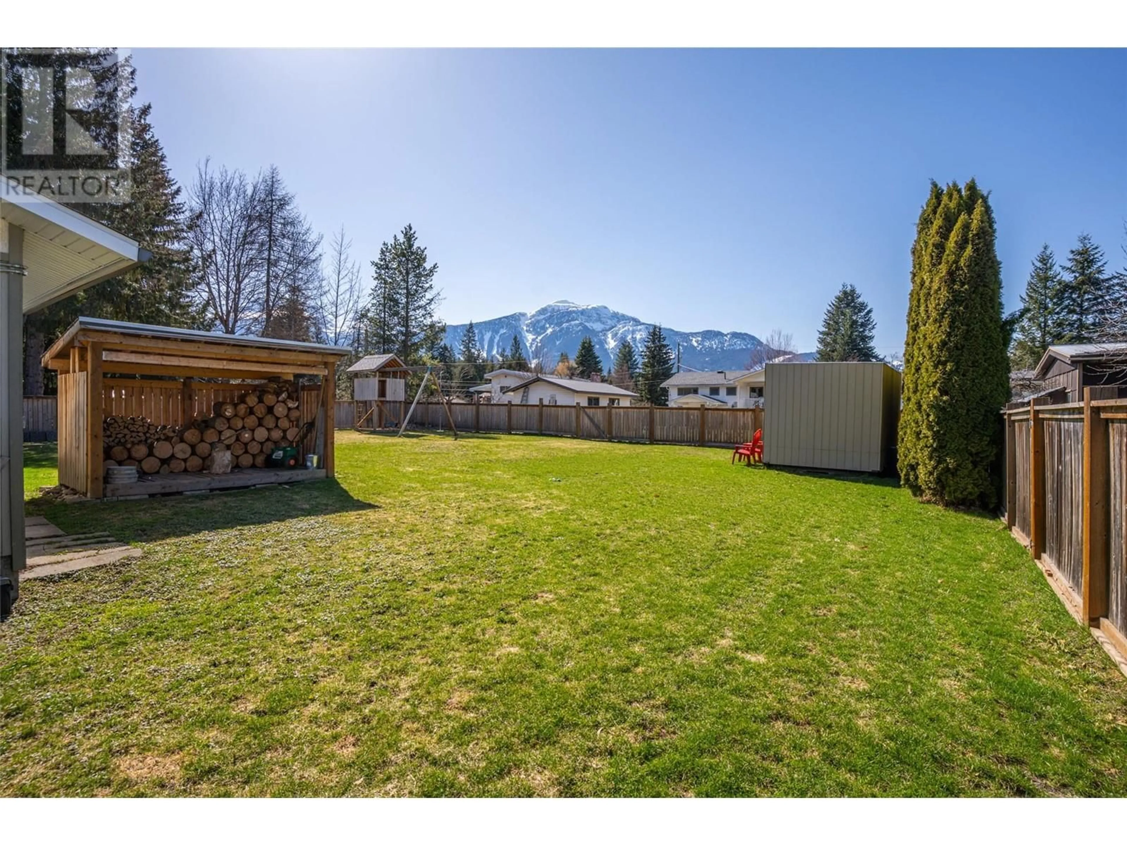 A pic from outside/outdoor area/front of a property/back of a property/a pic from drone, mountain view for 1727 TILLEN ROAD, Revelstoke British Columbia V0E2S1