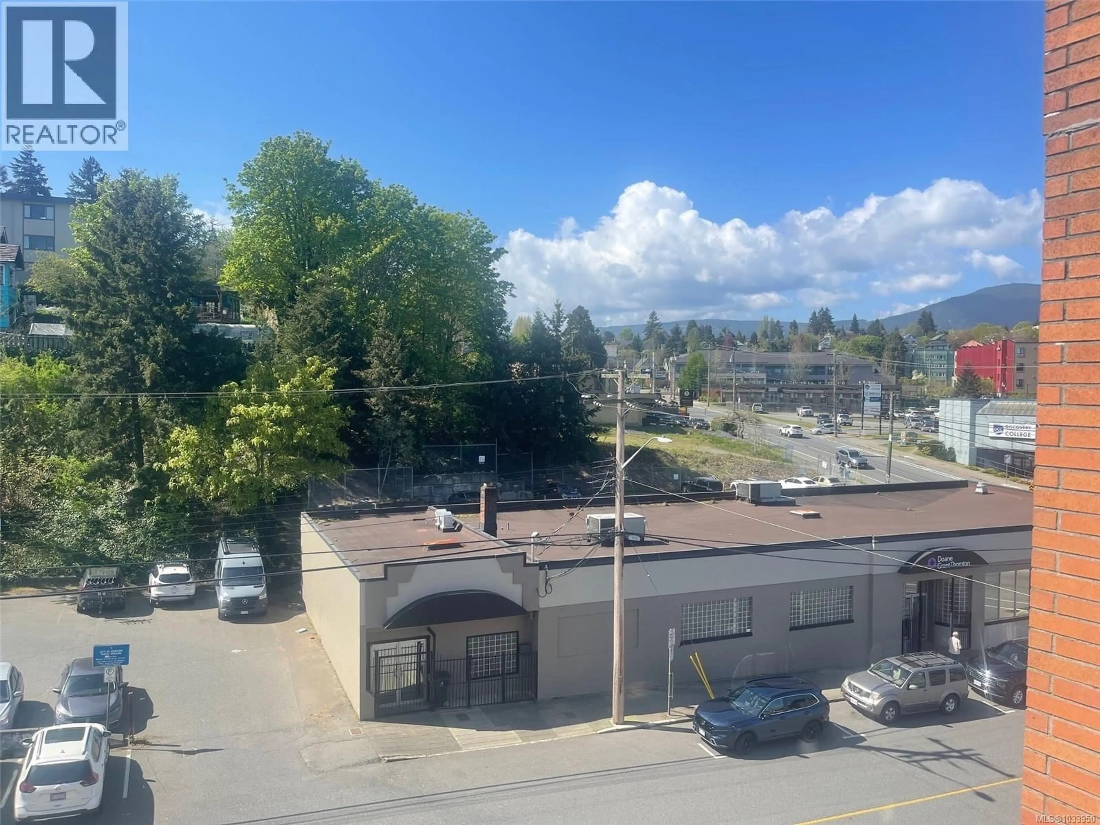 A pic from outside/outdoor area/front of a property/back of a property/a pic from drone, unknown for 304 - 30 CAVAN STREET, Nanaimo British Columbia V9R6K3