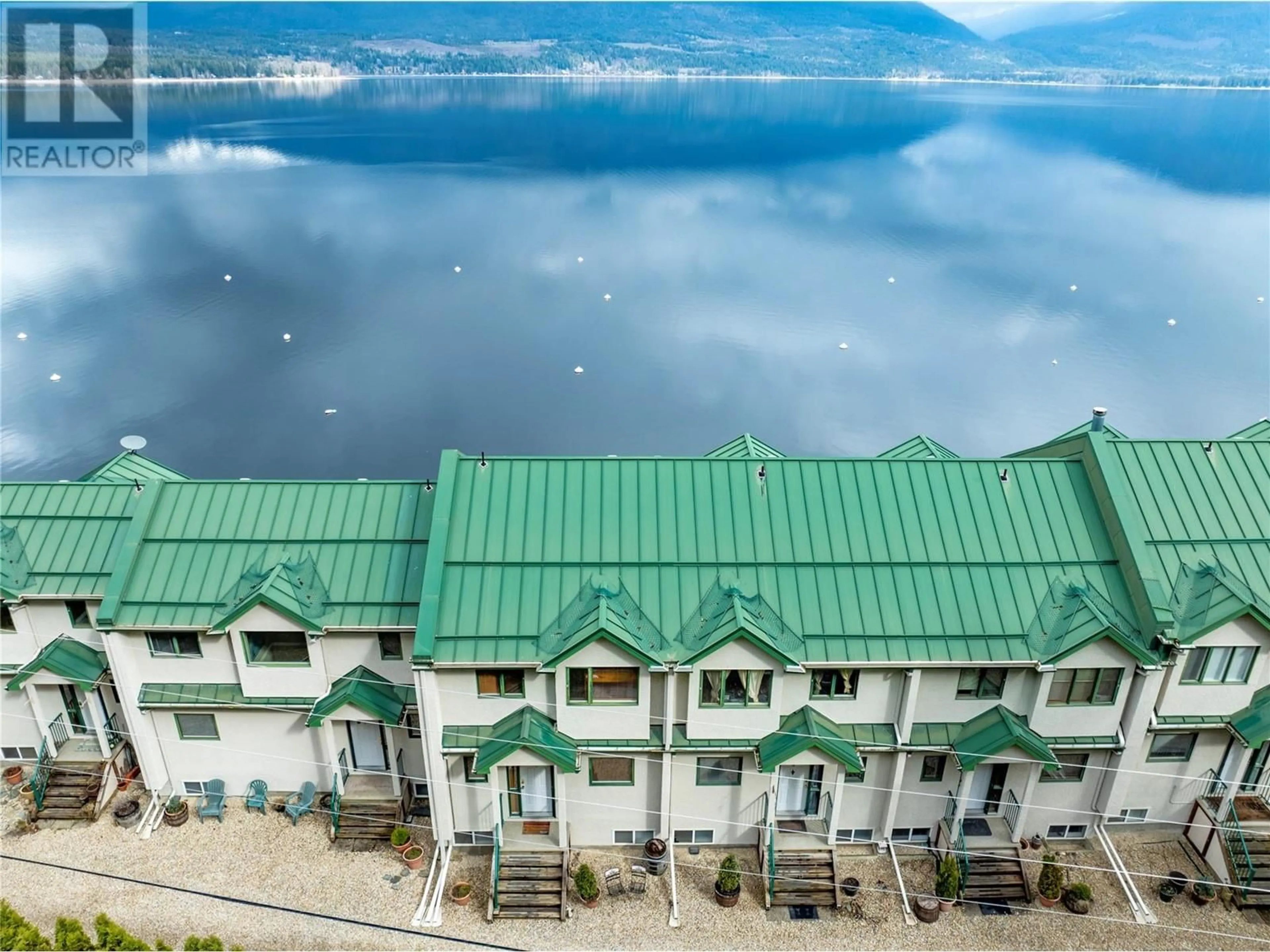 A pic from outside/outdoor area/front of a property/back of a property/a pic from drone, water/lake/river/ocean view for 3 - 3935 EAGLE BAY ROAD, Eagle Bay British Columbia V0E1T0