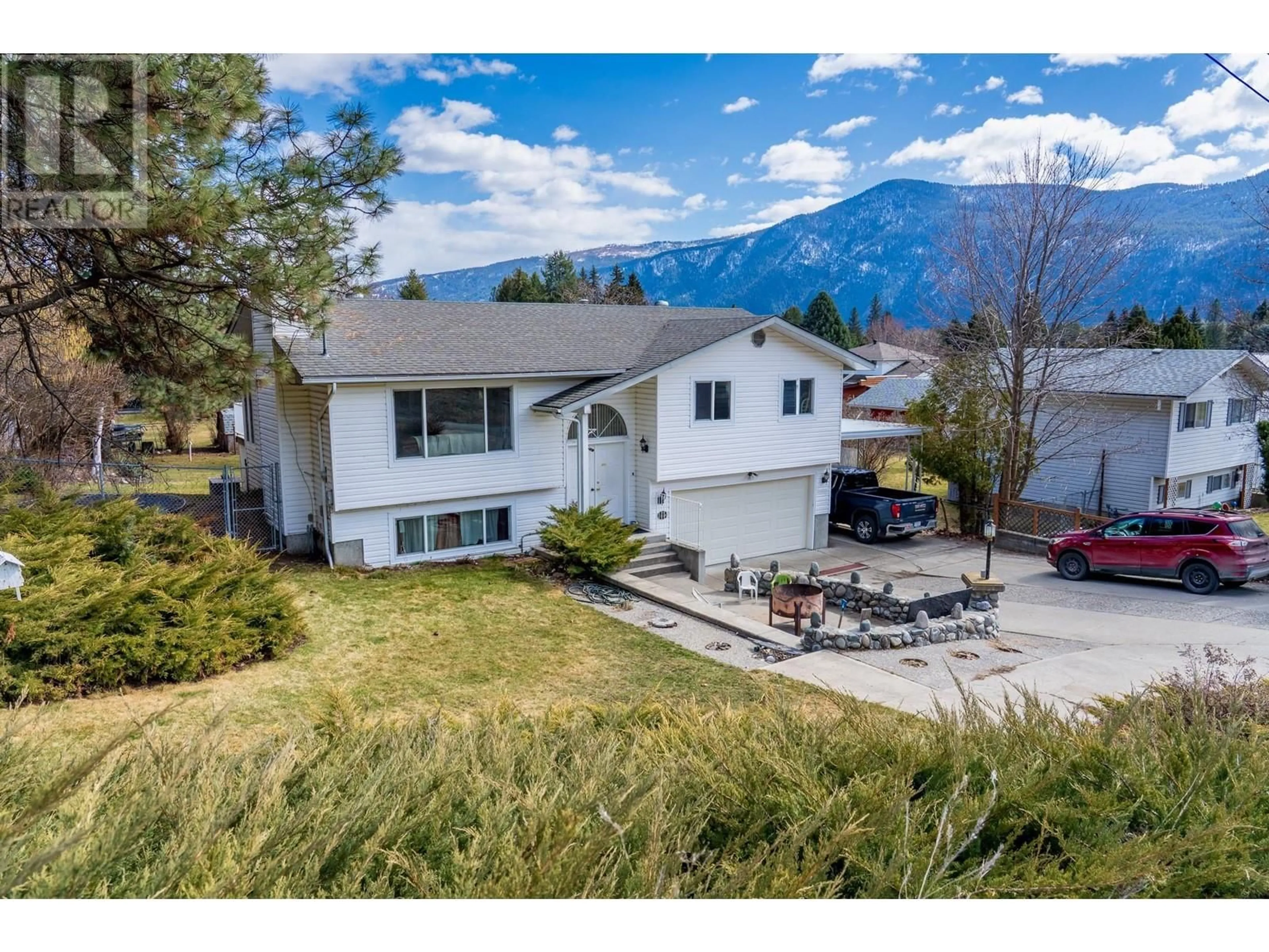 A pic from outside/outdoor area/front of a property/back of a property/a pic from drone, mountain view for 6846 GALENA AVENUE, Grand Forks British Columbia V0H1H2