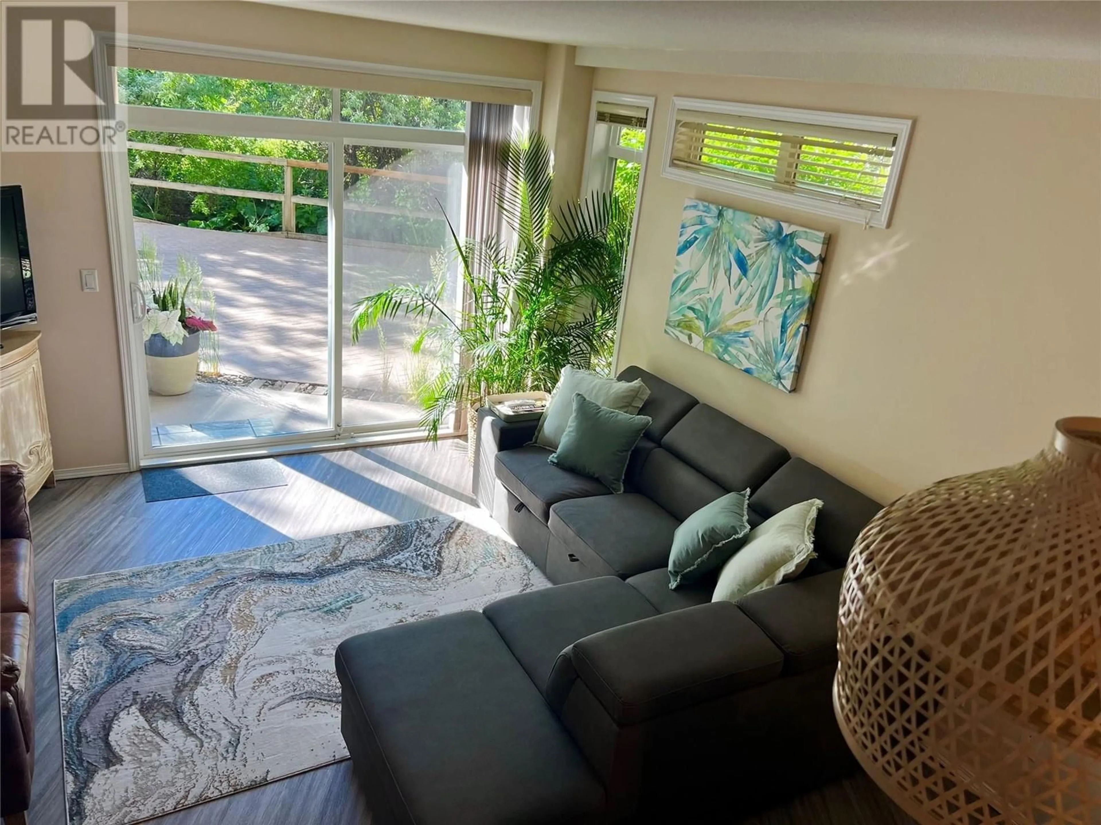 Living room with furniture, unknown for 106 - 1088 SUNSET DRIVE, Kelowna British Columbia V1Y9W1