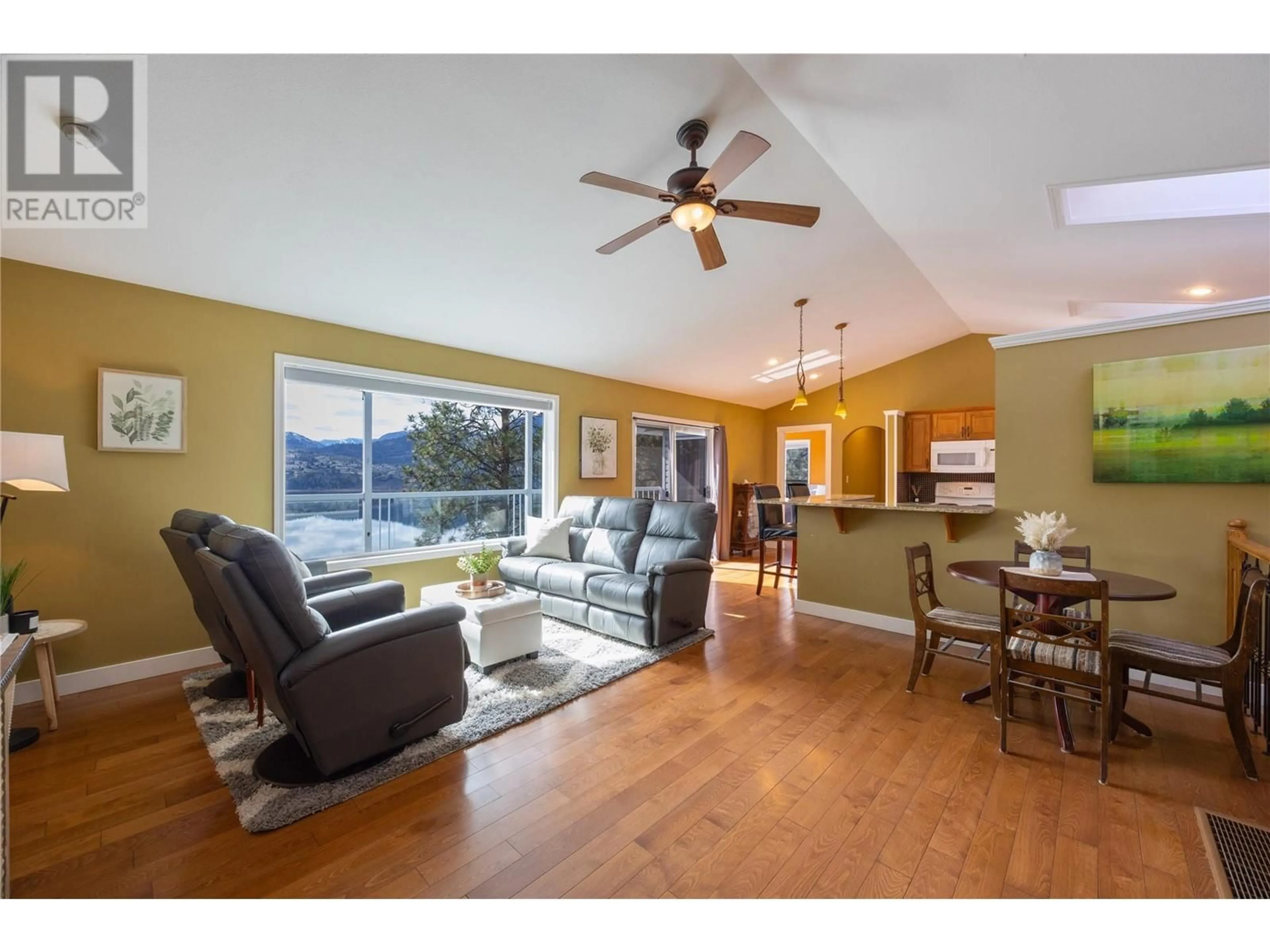 Living room with furniture, wood/laminate floor for 133 EAGLE RIDGE ROAD, Okanagan Falls British Columbia V0H1R3