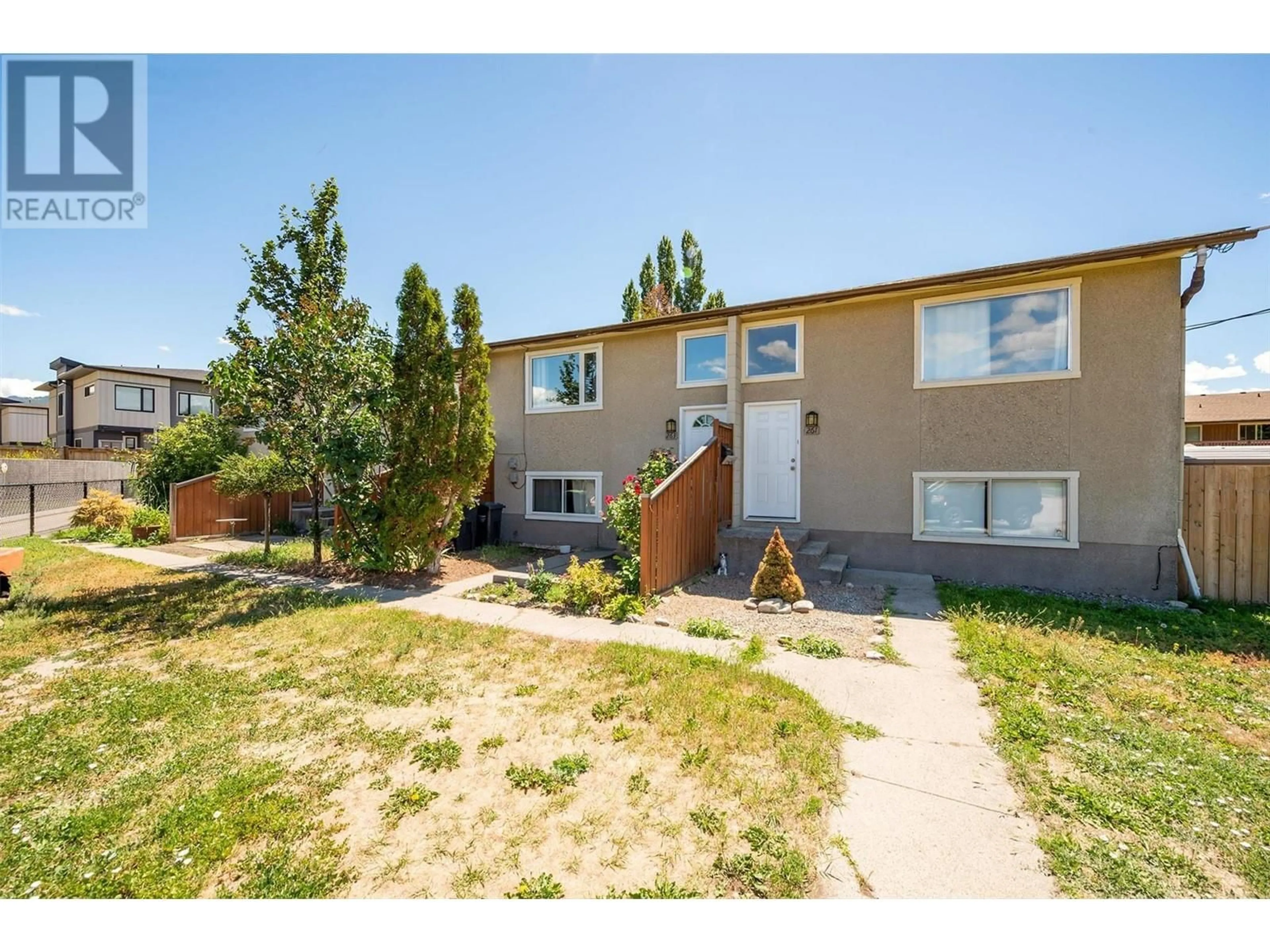 A pic from outside/outdoor area/front of a property/back of a property/a pic from drone, street for 265 FIR COURT, Kelowna British Columbia V1X2B8