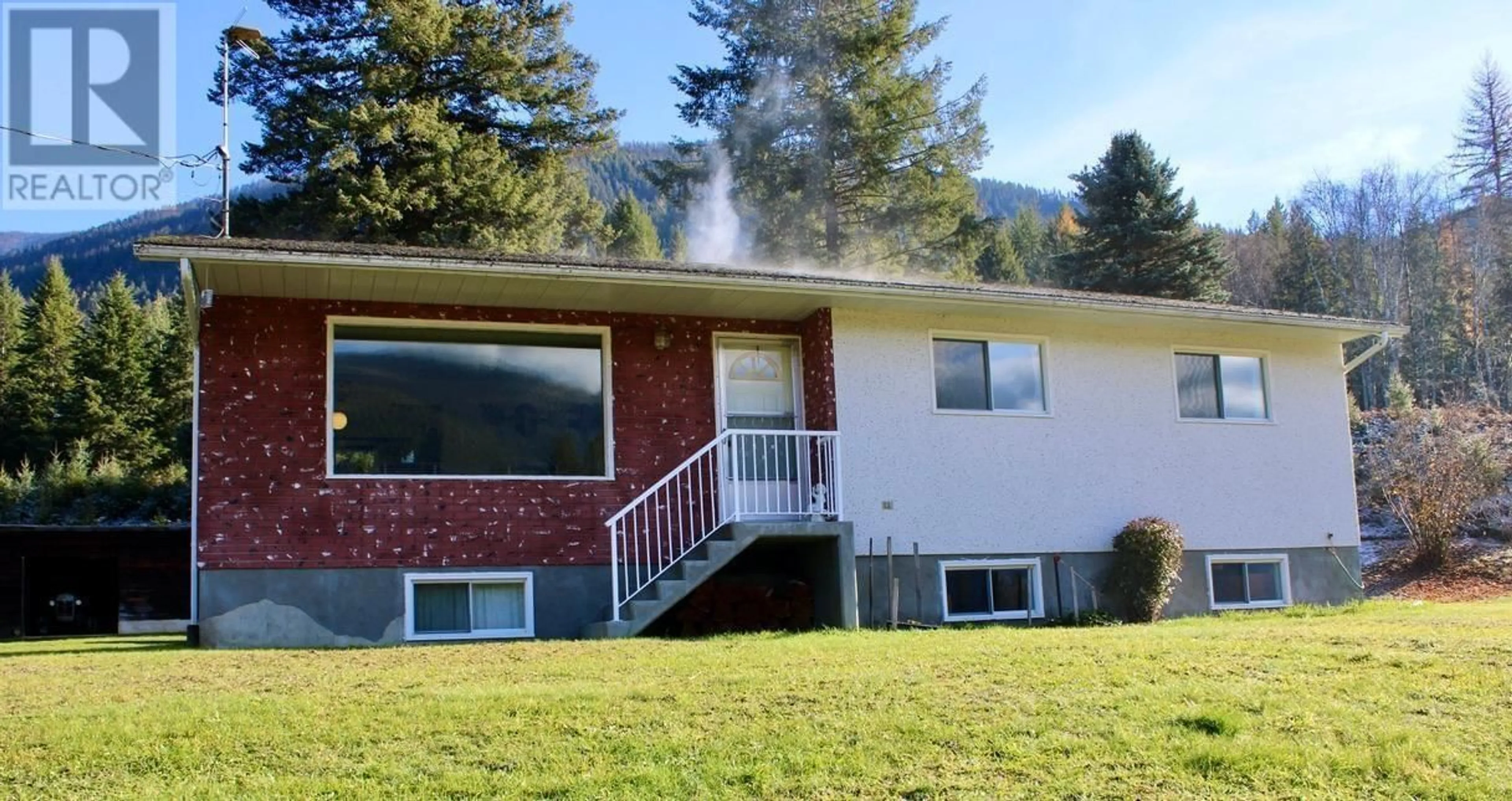 Home with vinyl exterior material, mountain view for 6915 KIMOFF ROAD, Appledale British Columbia V0G2J0
