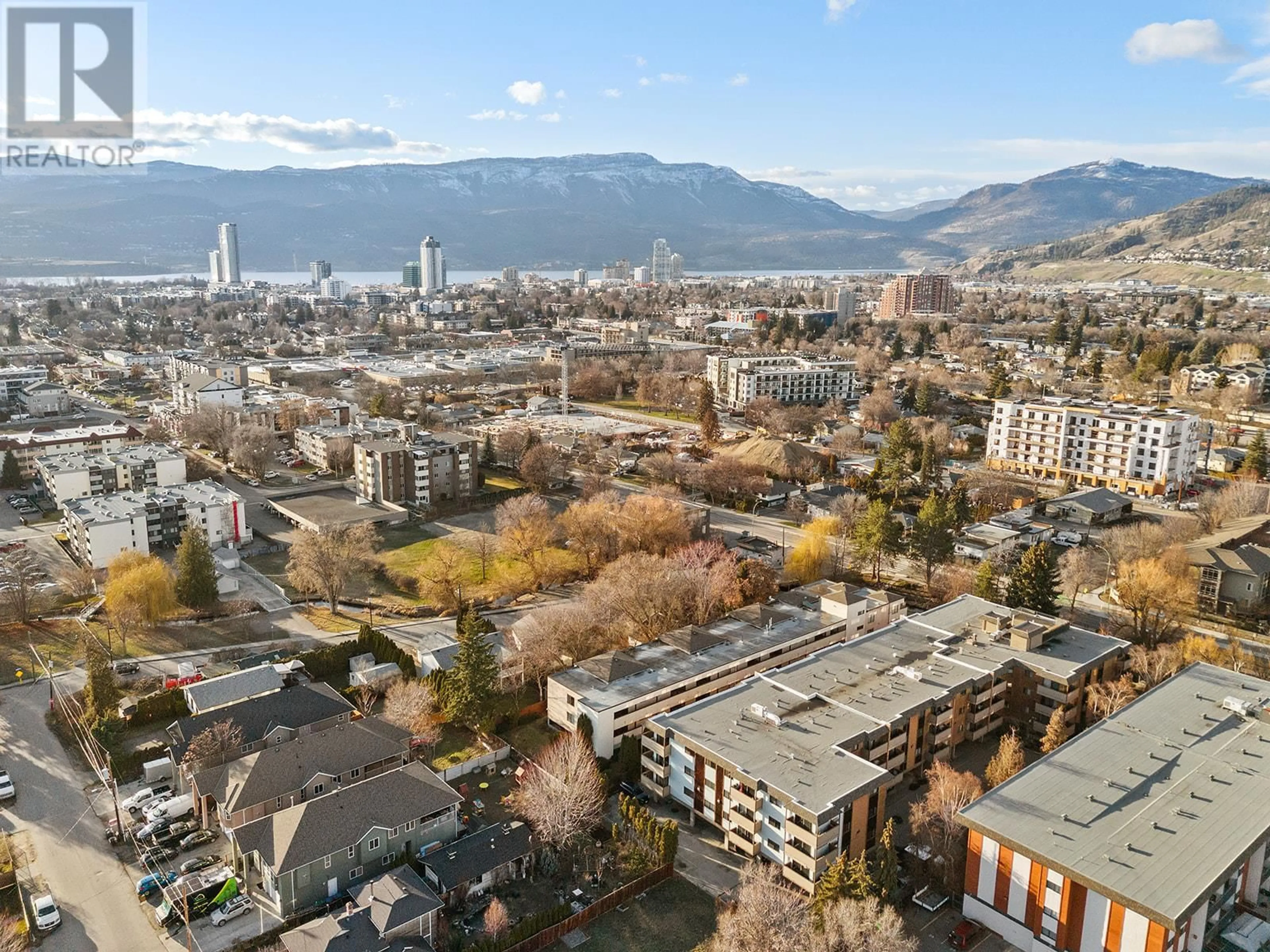 A pic from outside/outdoor area/front of a property/back of a property/a pic from drone, mountain view for 205 - 1903 LINDAHL STREET, Kelowna British Columbia V1Y3Z6