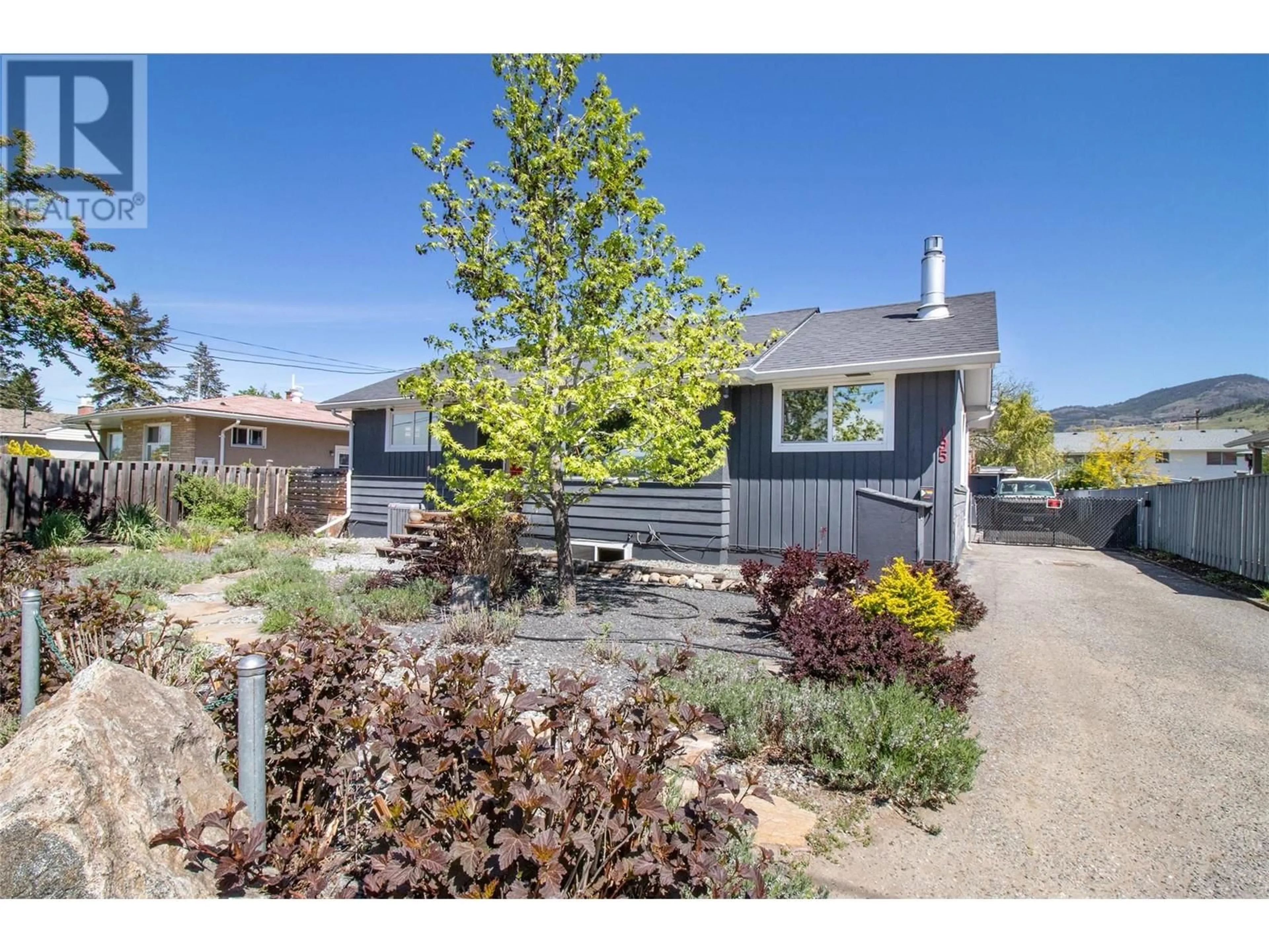 Home with vinyl exterior material, street for 195 SADLER ROAD, Kelowna British Columbia V1X2Y6