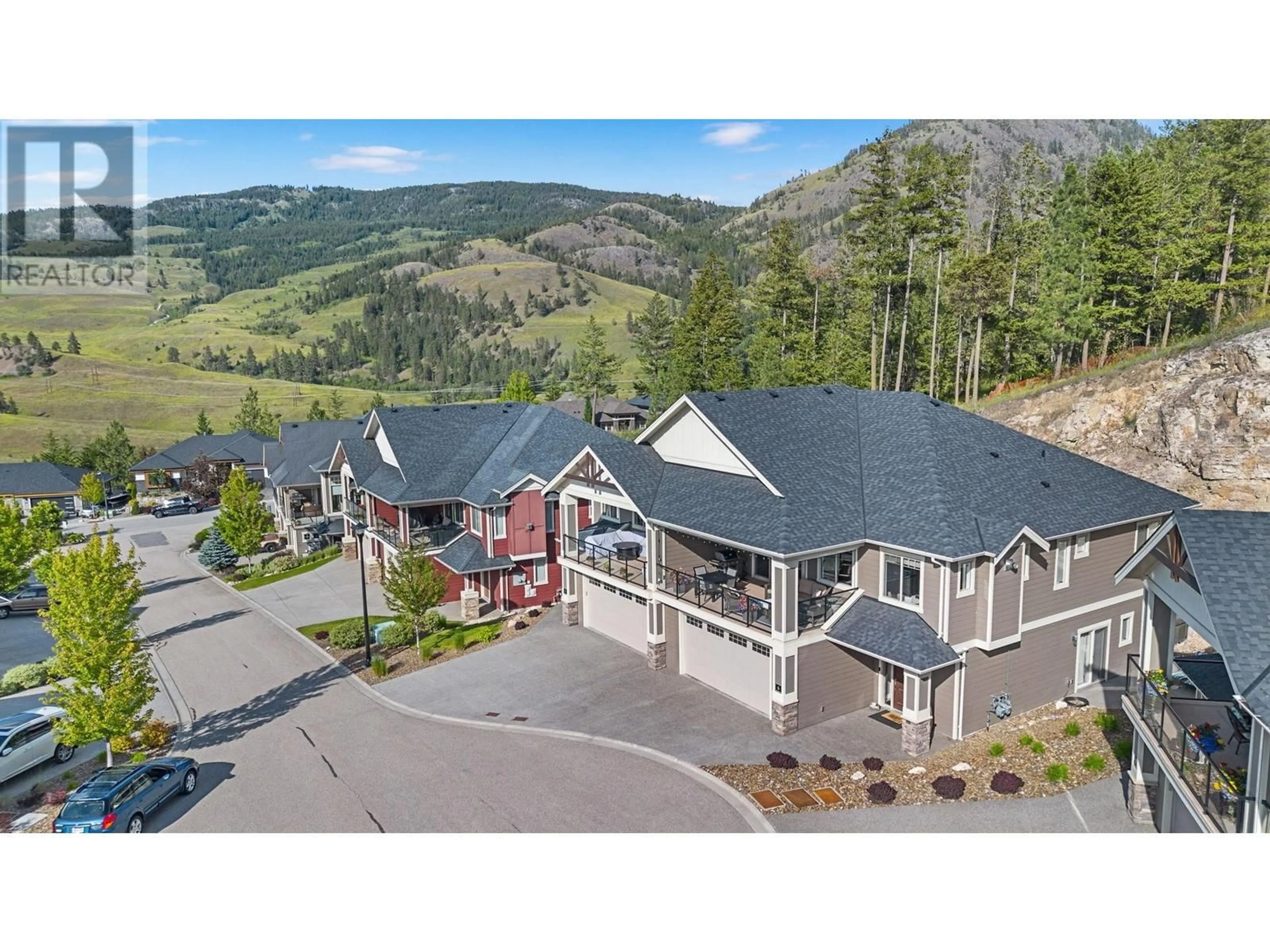 A pic from outside/outdoor area/front of a property/back of a property/a pic from drone, mountain view for 6 - 875 STOCKLEY STREET, Kelowna British Columbia V1P1S4