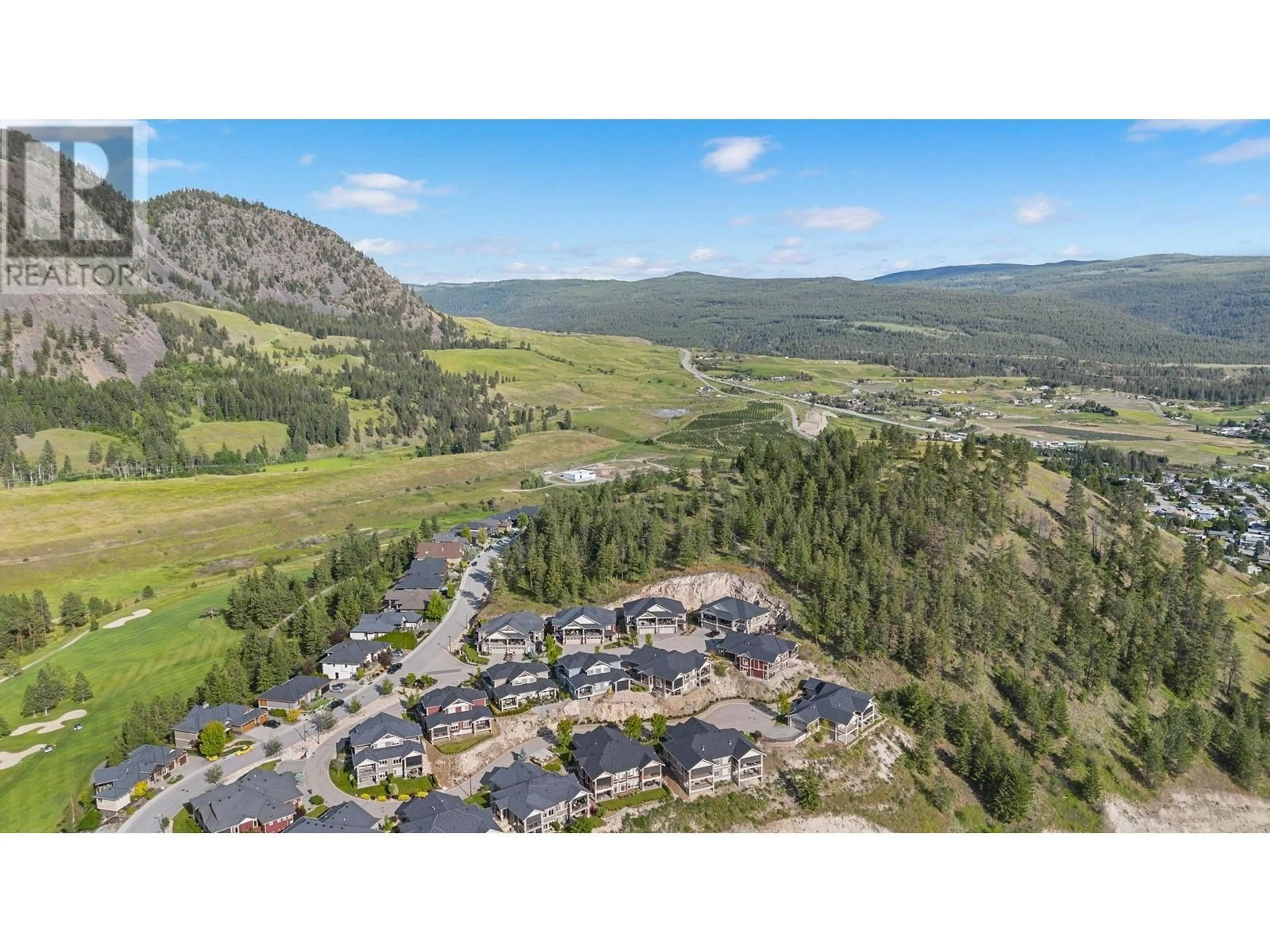 A pic from outside/outdoor area/front of a property/back of a property/a pic from drone, mountain view for 6 - 875 STOCKLEY STREET, Kelowna British Columbia V1P1S4
