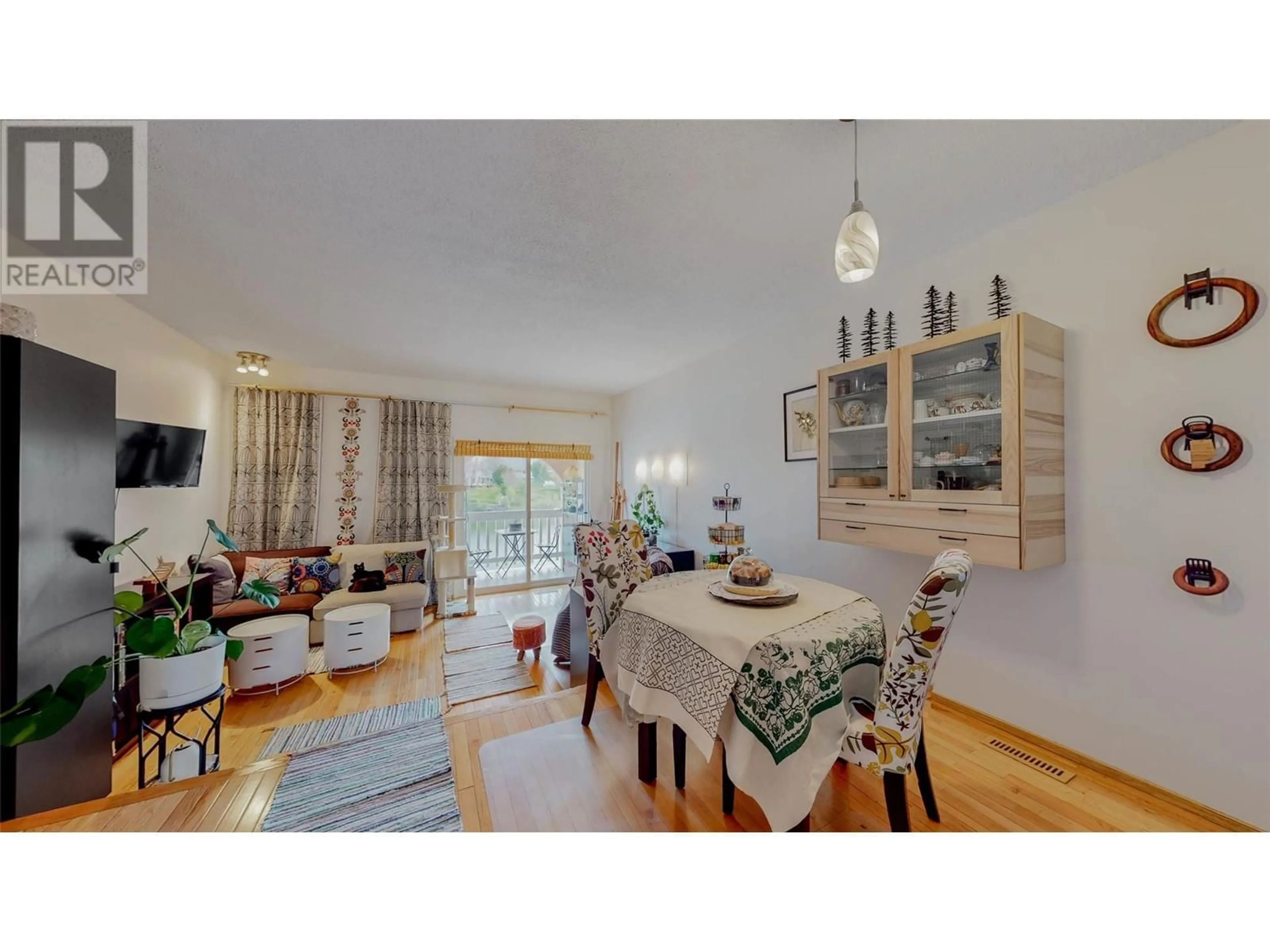 Dining room, wood/laminate floor for 8029 VEDETTE DRIVE, Osoyoos British Columbia V0H1V2