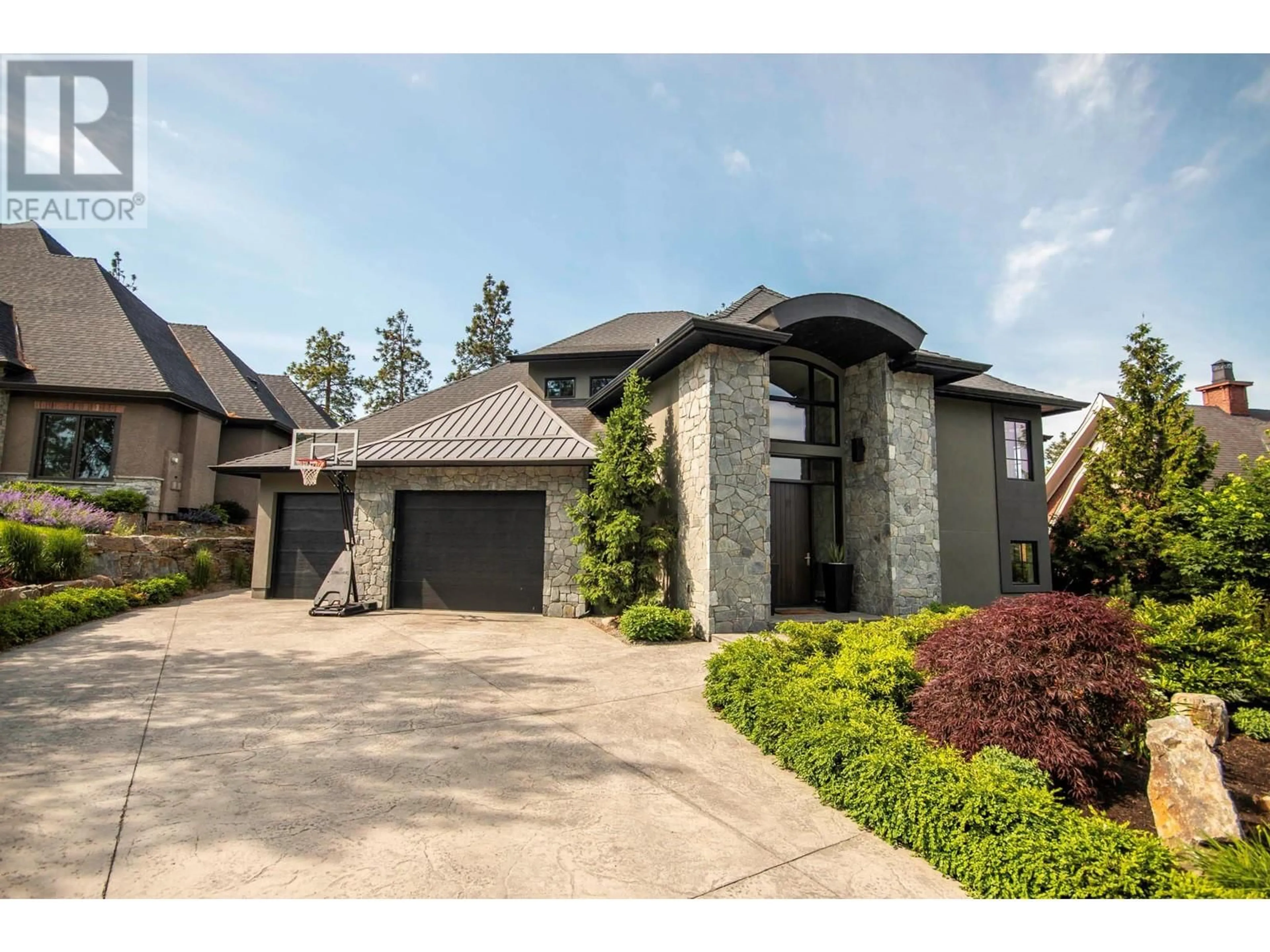 Home with brick exterior material, street for 971 Westpoint Drive, Kelowna British Columbia V1W2Z3