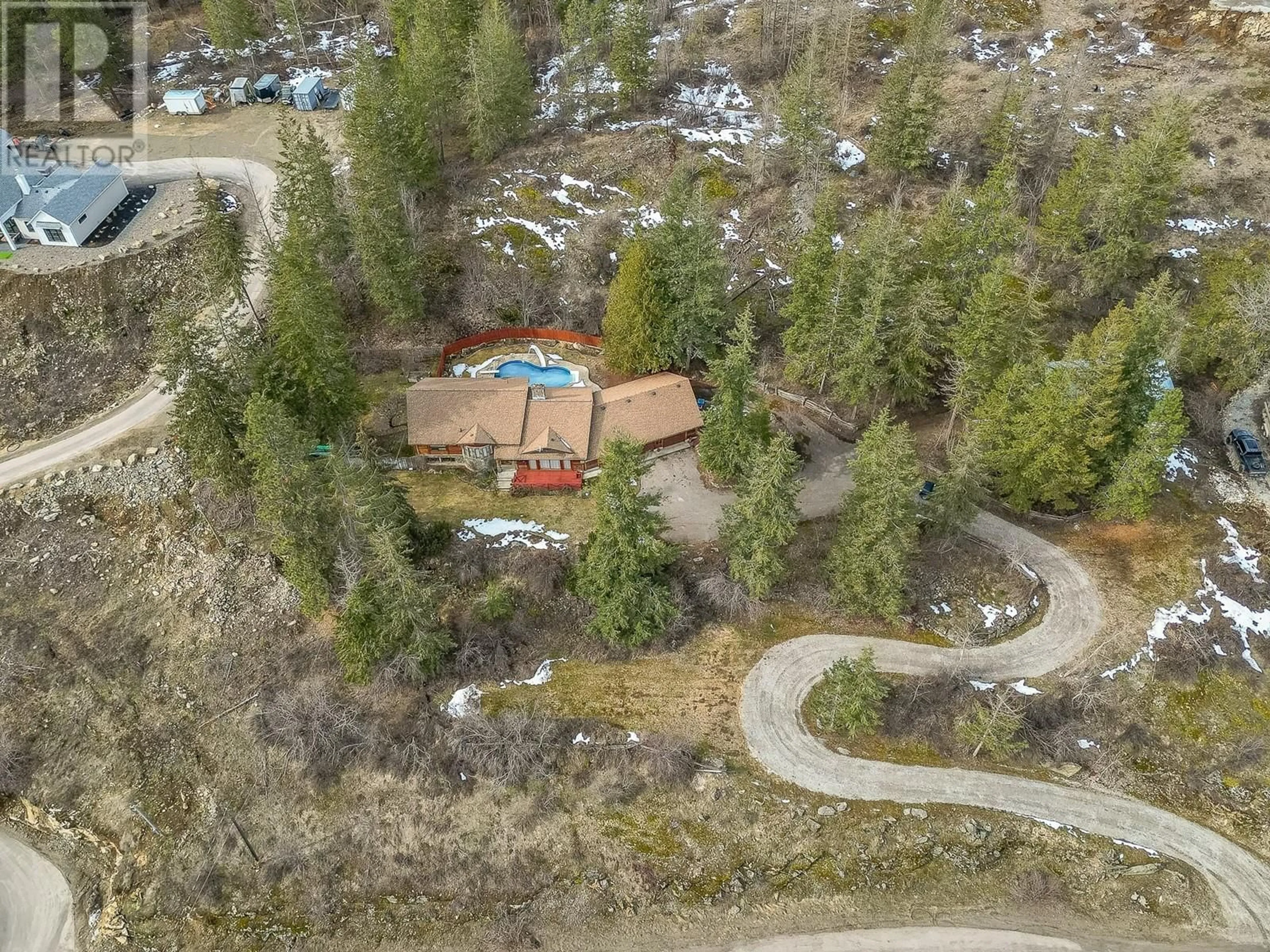 A pic from outside/outdoor area/front of a property/back of a property/a pic from drone, forest/trees view for 98 TWIN LAKES ROAD, Enderby British Columbia V0E1V3